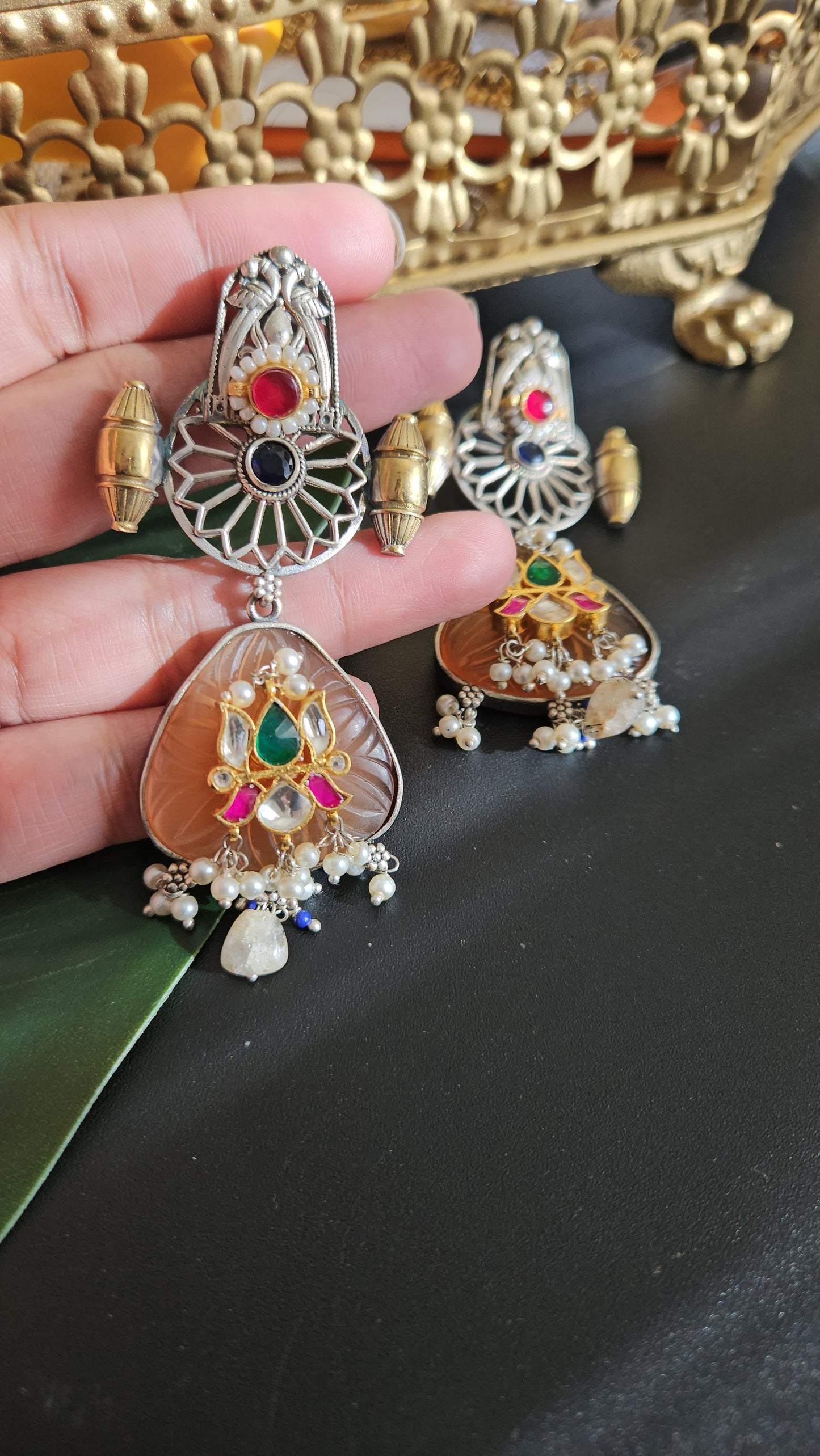 Anugna kemp silver alike earrings