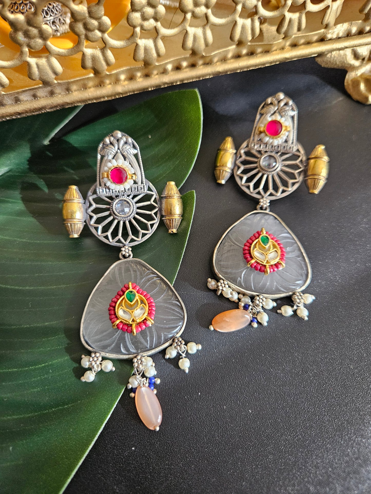 Anugna kemp silver alike earrings