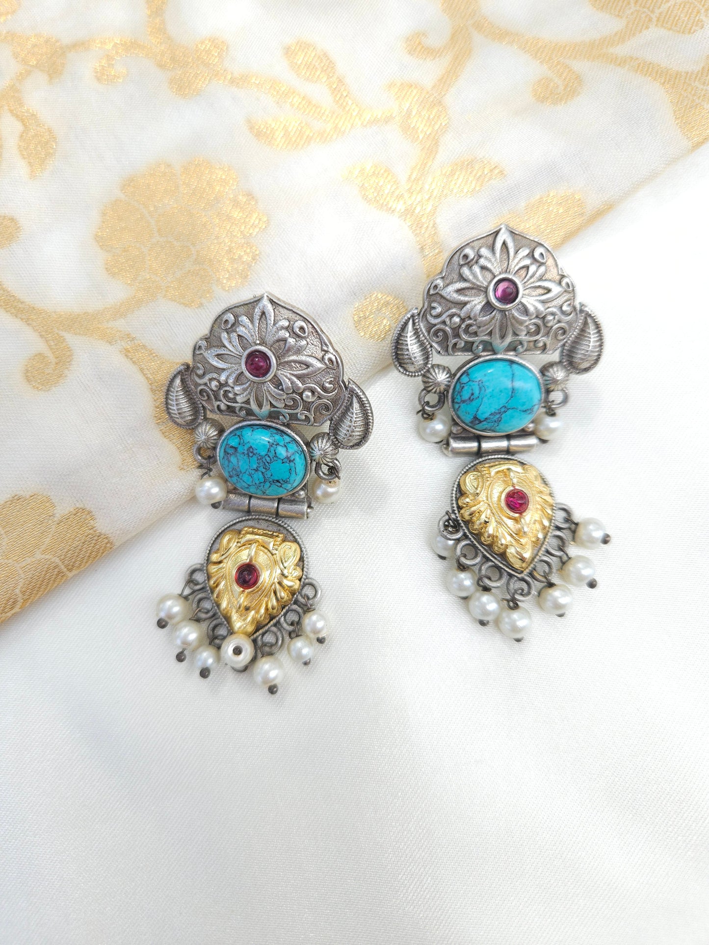 Aditya silver alike earrings