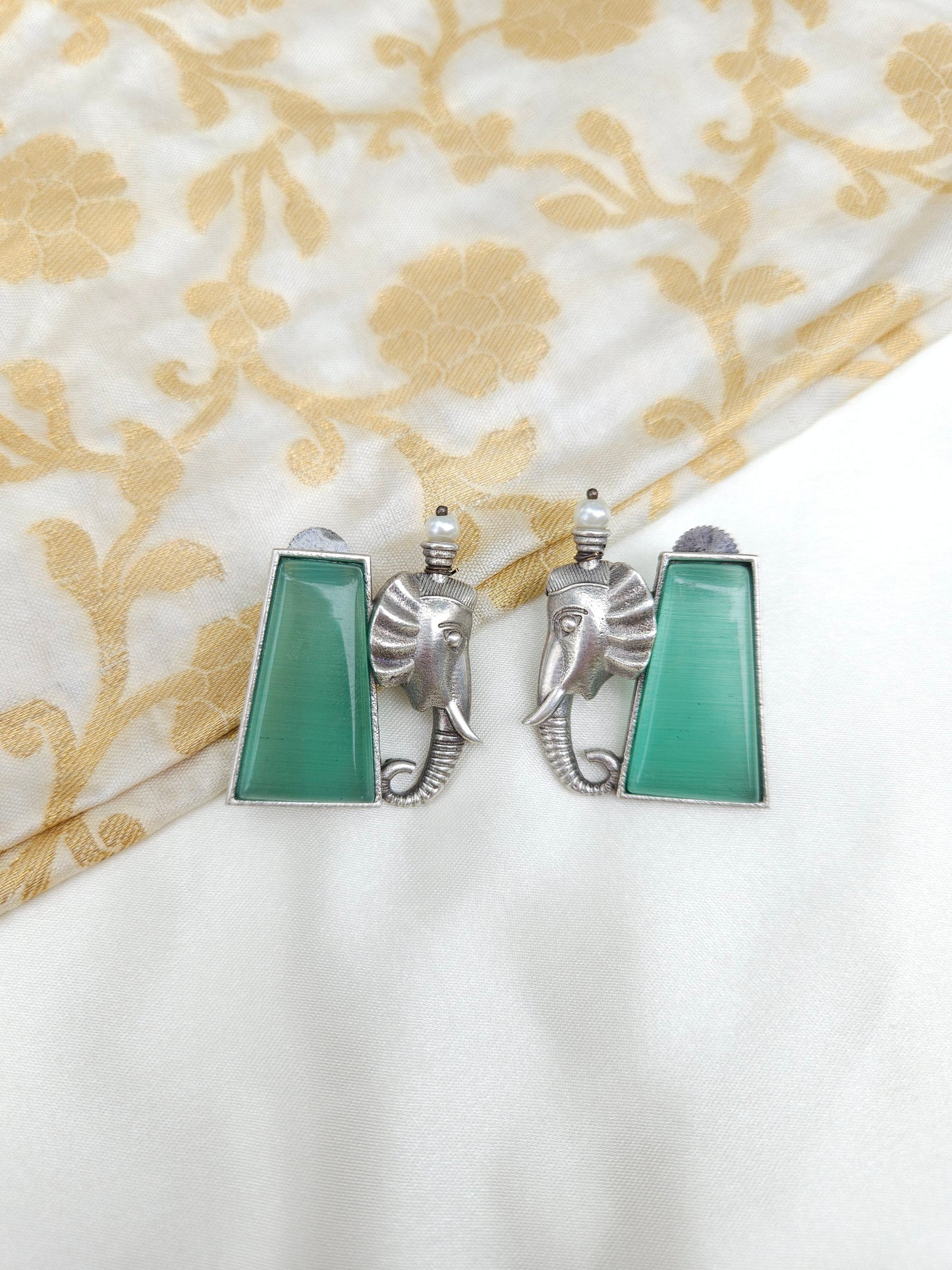 Aditya  silver alike earrings