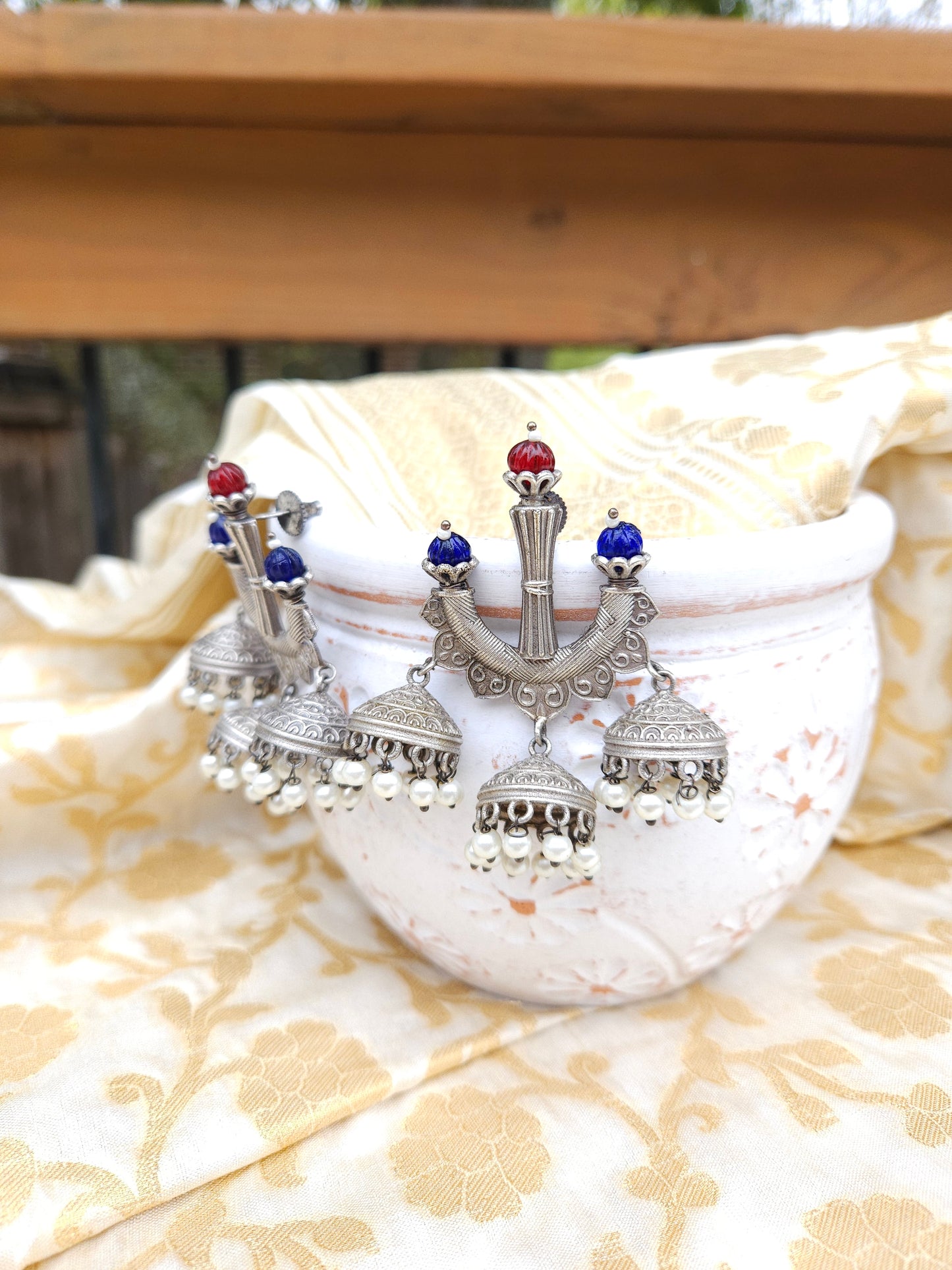 Aditya silver alike jhumka earrings