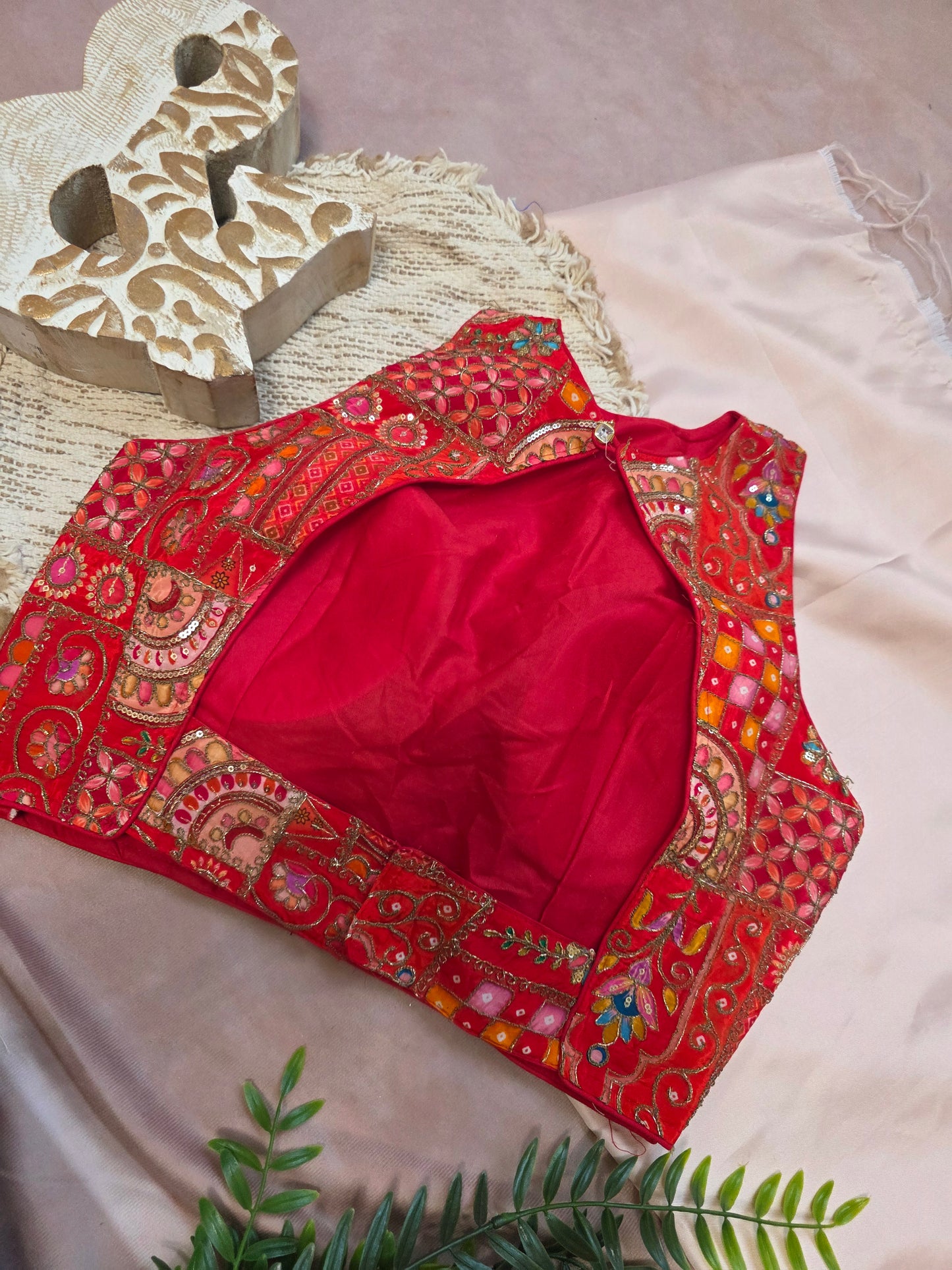 Red Embroidered sleeveless Blouse