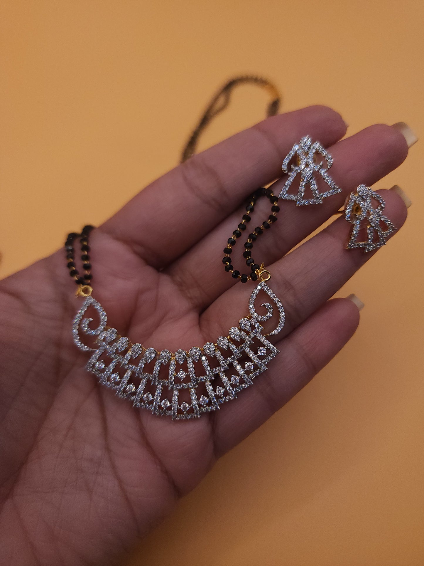 Bhavani Gold plated black bead necklace set