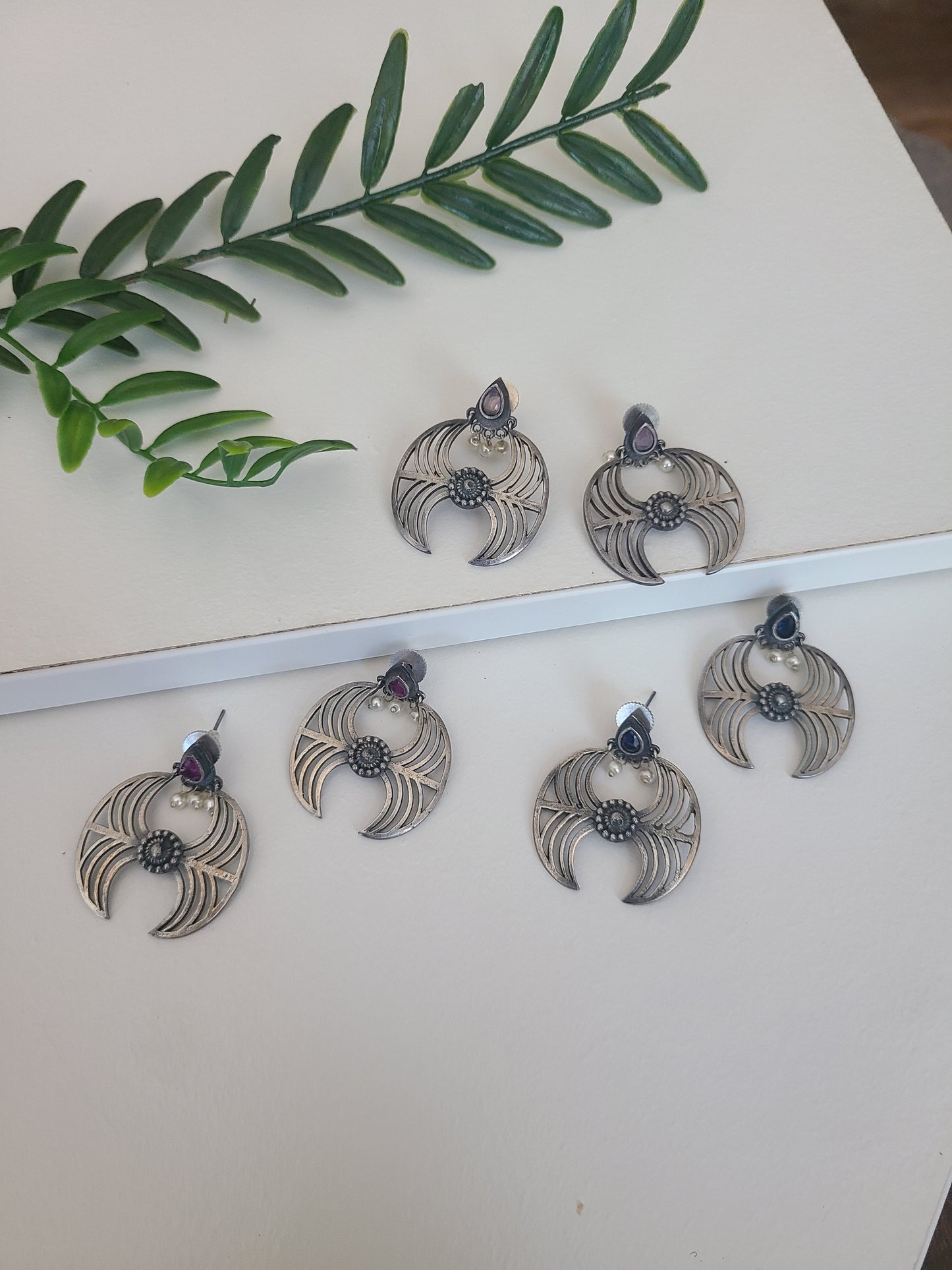 Unique silver alike earrings