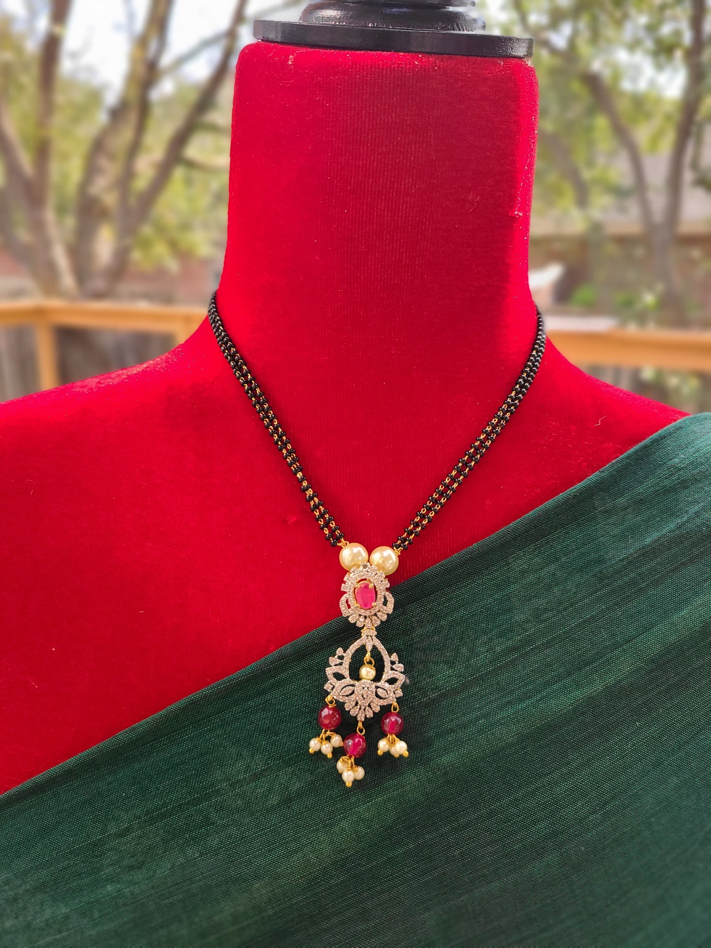 Bhoomi Gold plated black bead necklace set
