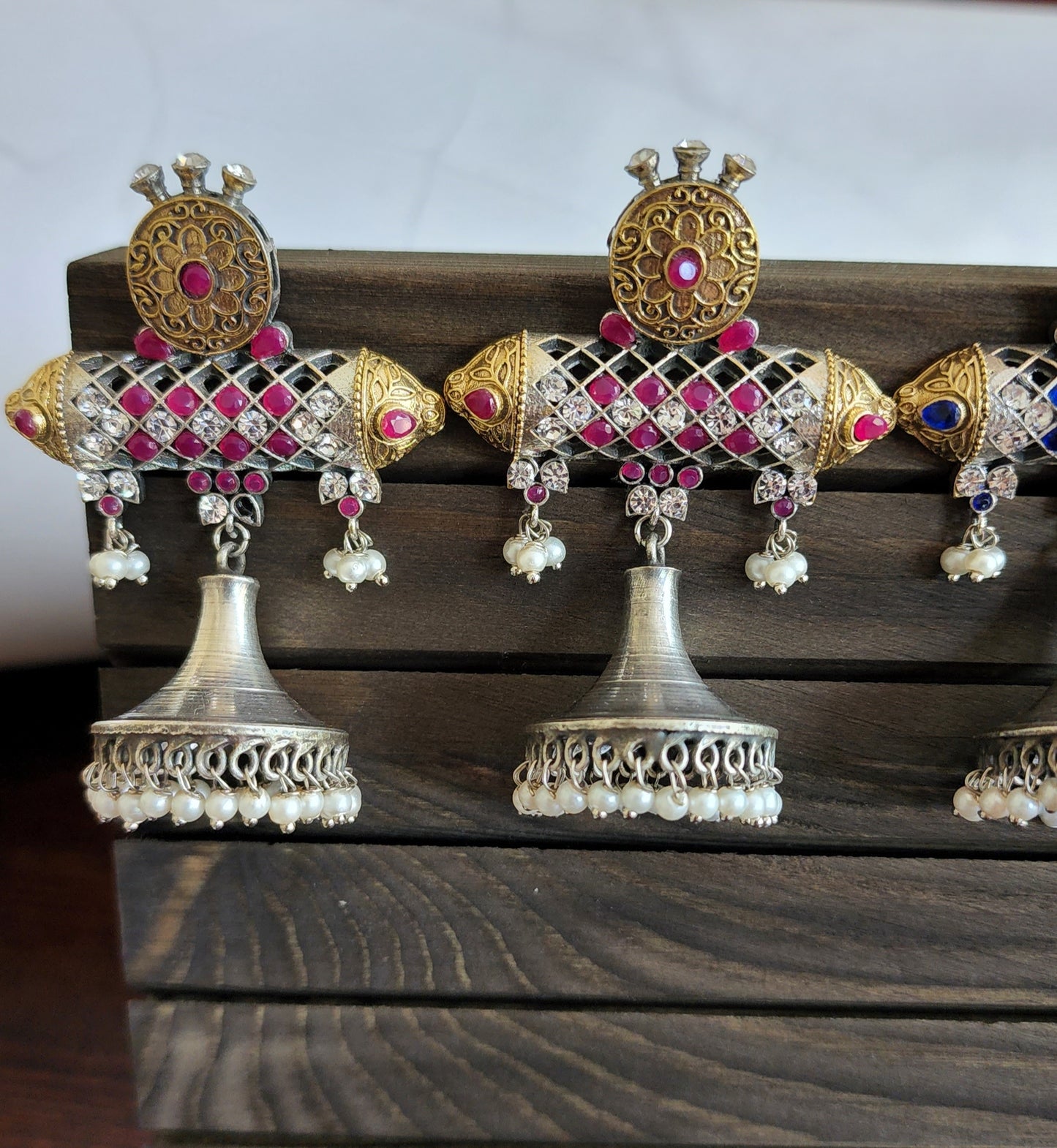 Aastha dualtone jhumka earrings
