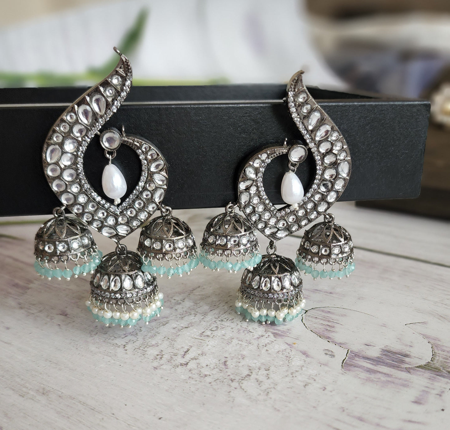 Rodium plated jhumka earrings