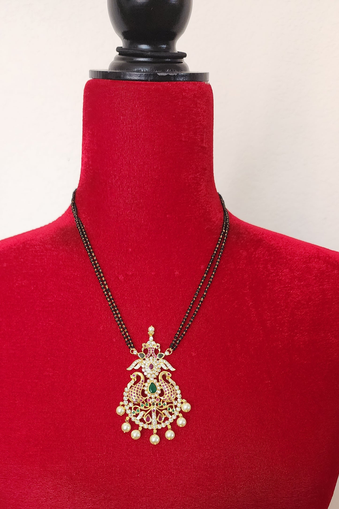 Bhanu Gold plated black bead necklace set