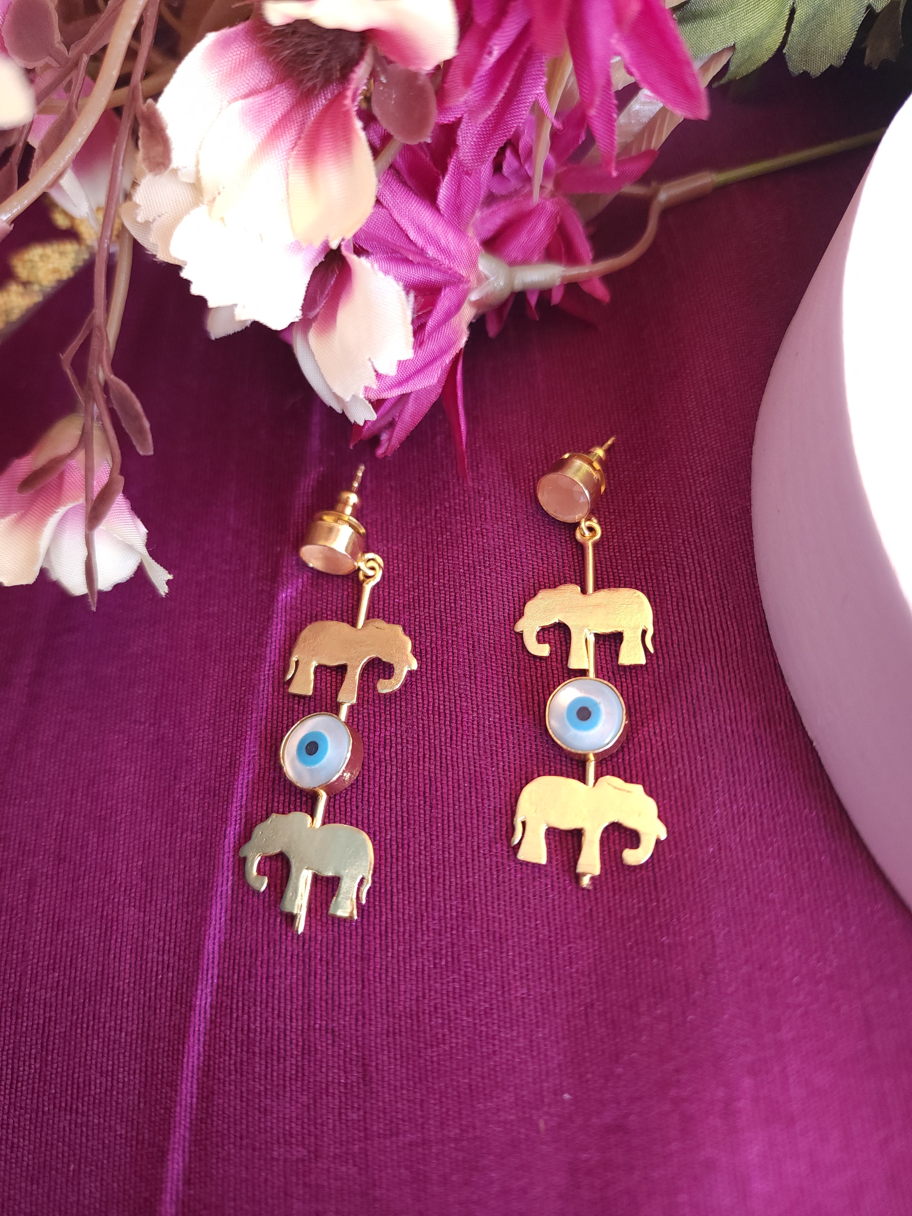 Evil eye elephant contemporary earrings