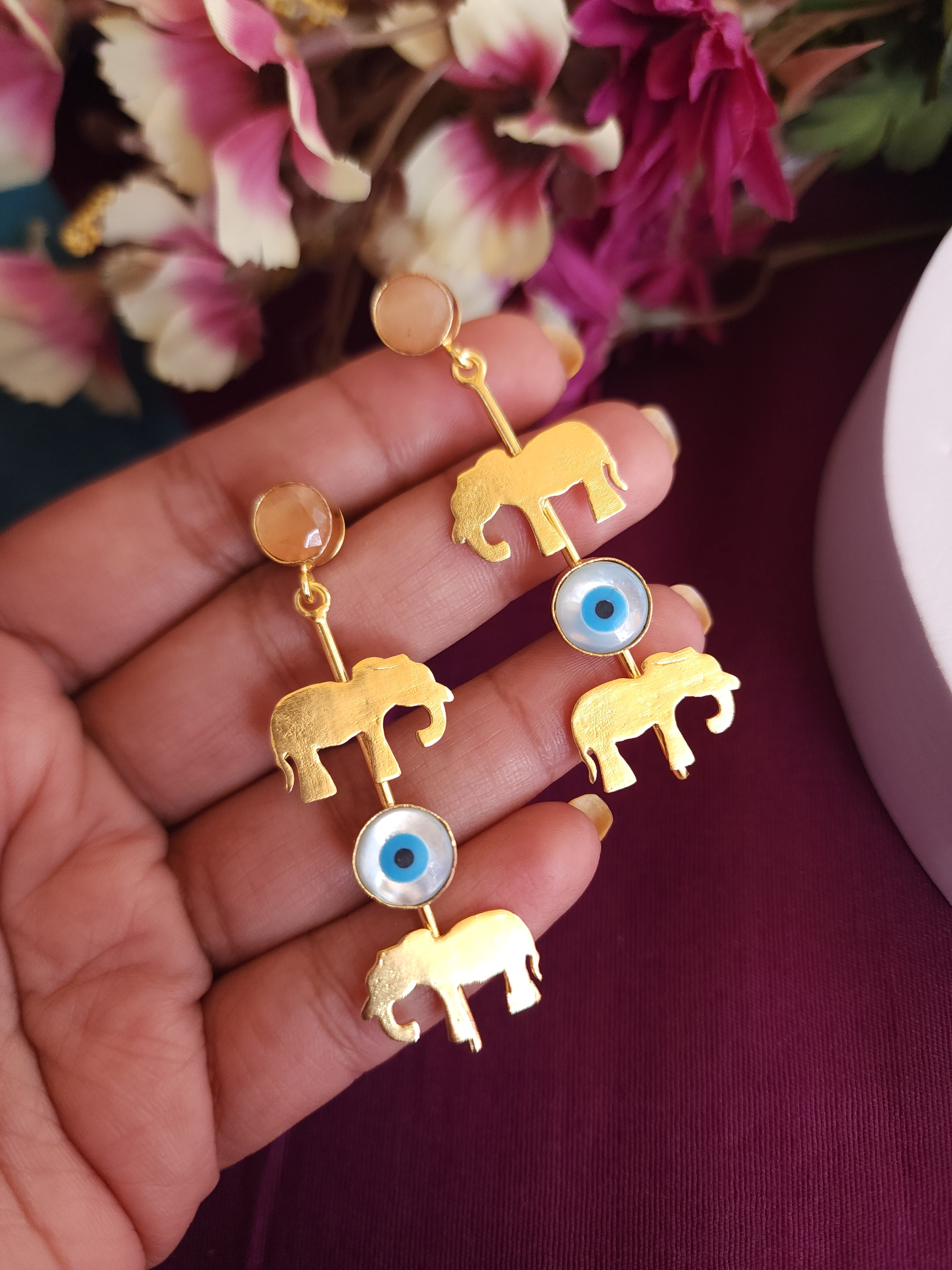 Evil eye elephant contemporary earrings