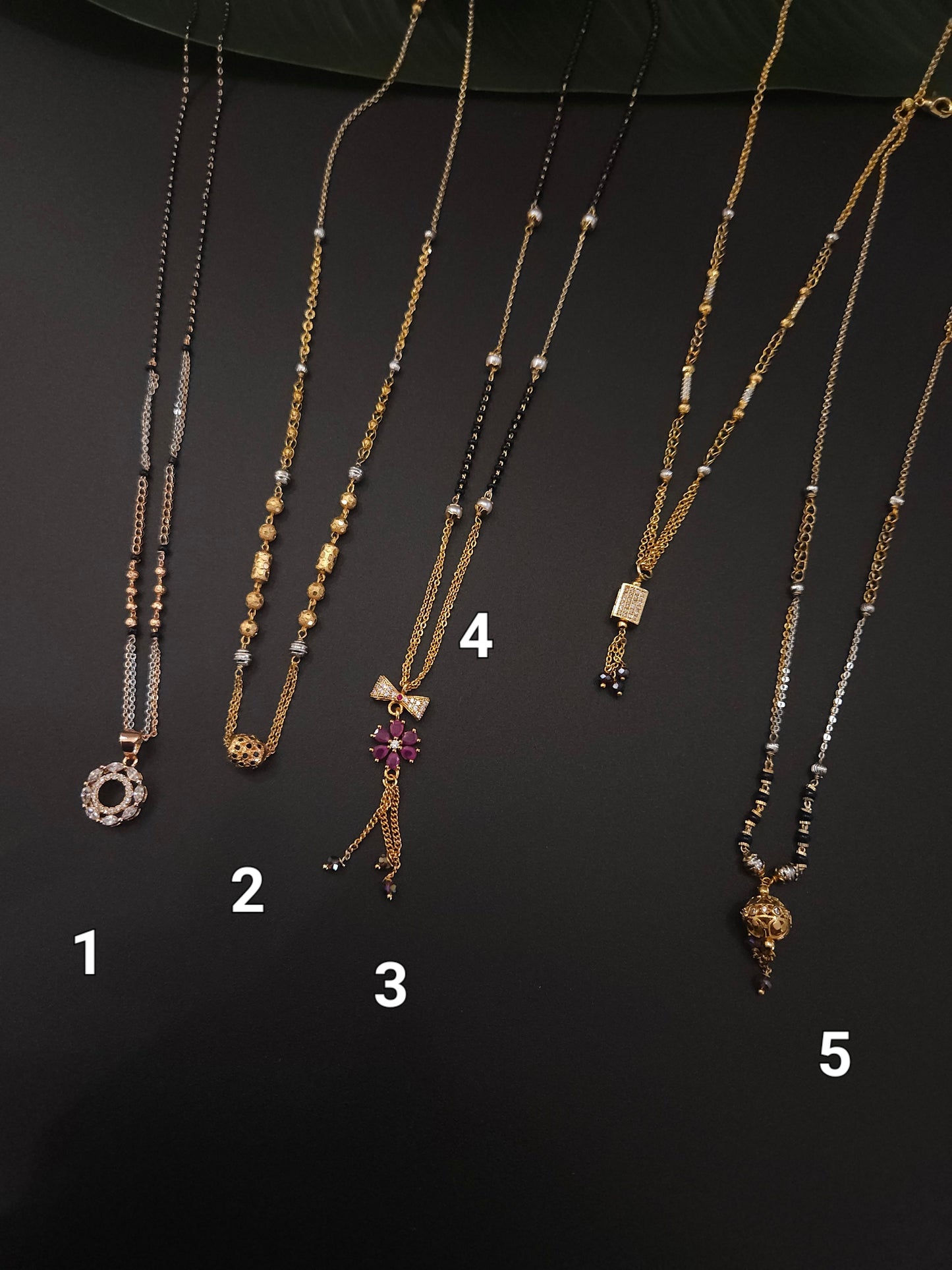 Bruh Gold plated black bead necklace