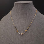 Bruh Gold plated black bead necklace