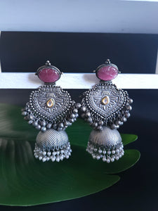 Keila silver polish fusion jhumka earrings