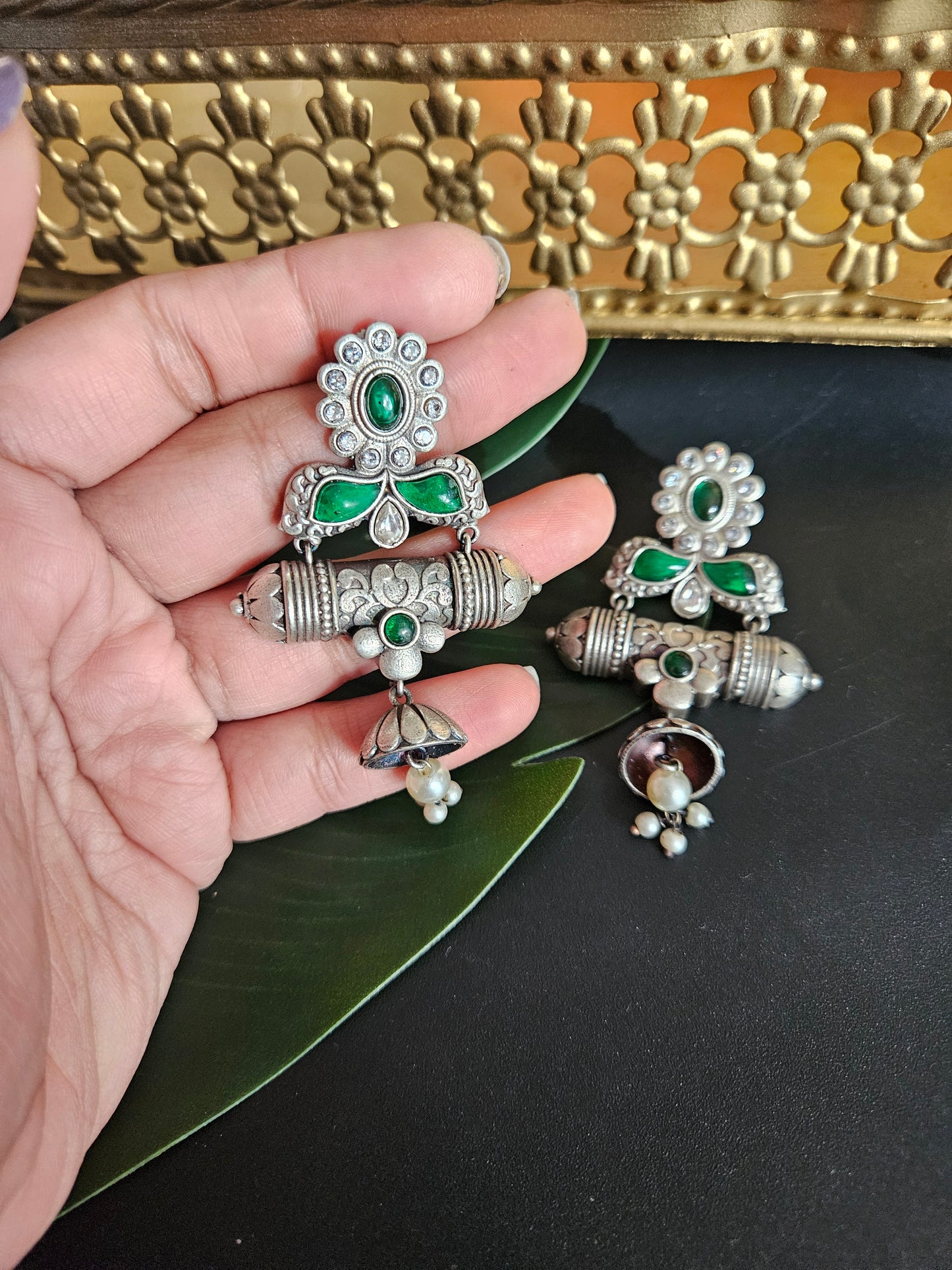 Anugna kemp silver alike earrings