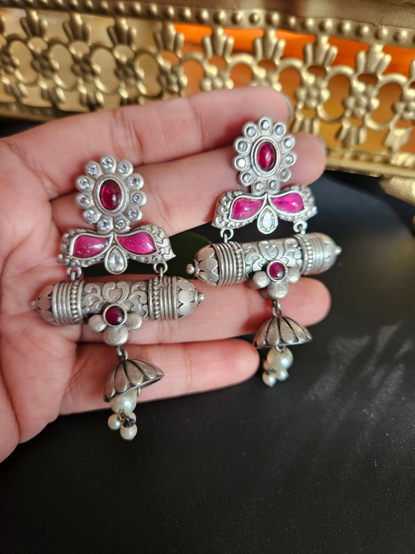 Anugna kemp silver alike earrings