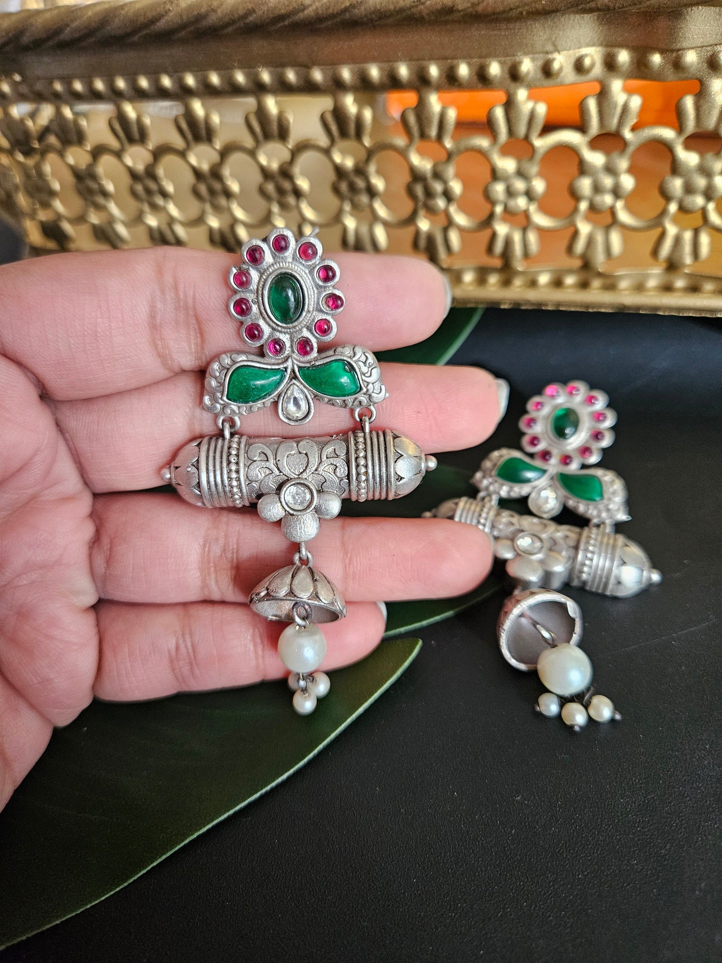 Anugna kemp silver alike earrings