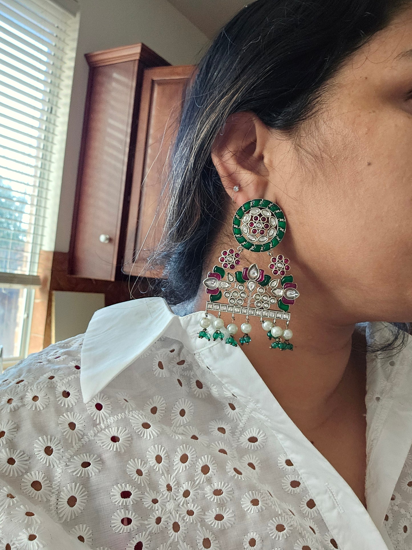 Anugna kemp silver alike earrings
