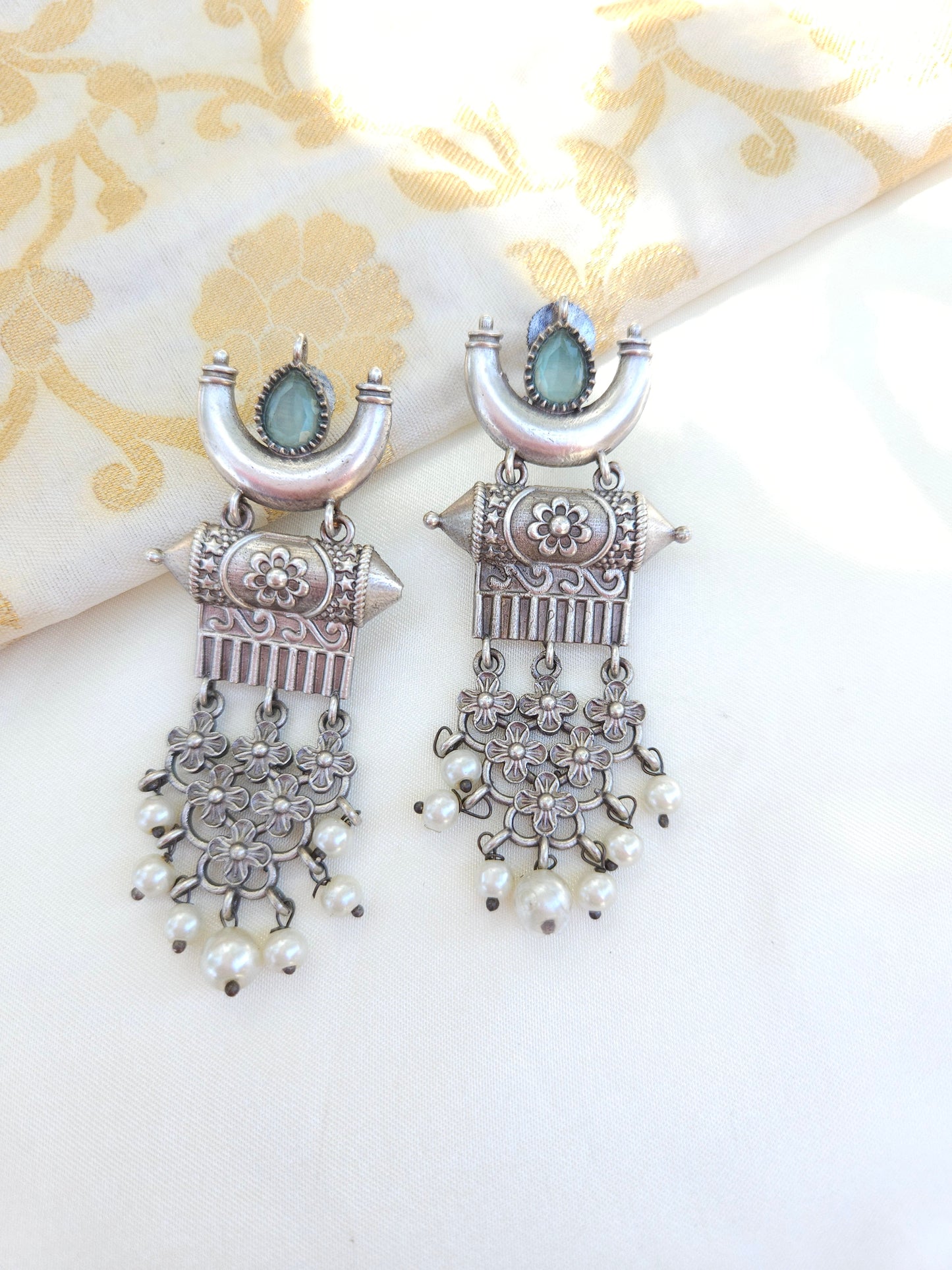 Aditya silver alike earrings