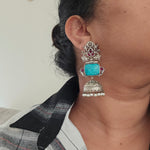 Aditya  silver alike jhumka earrings