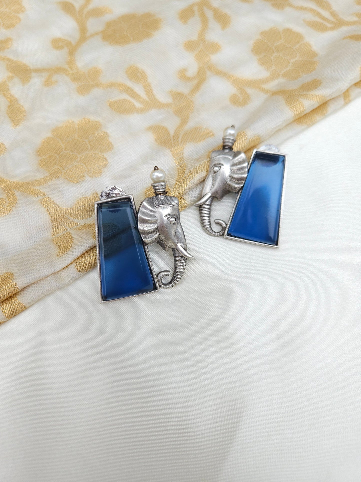 Aditya  silver alike earrings