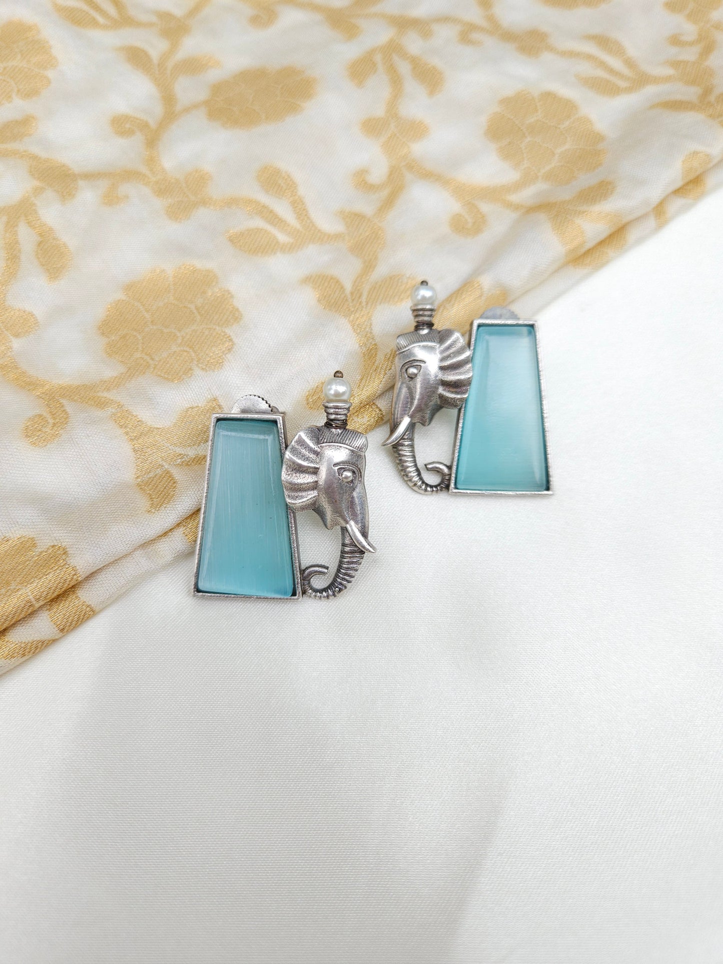 Aditya  silver alike earrings