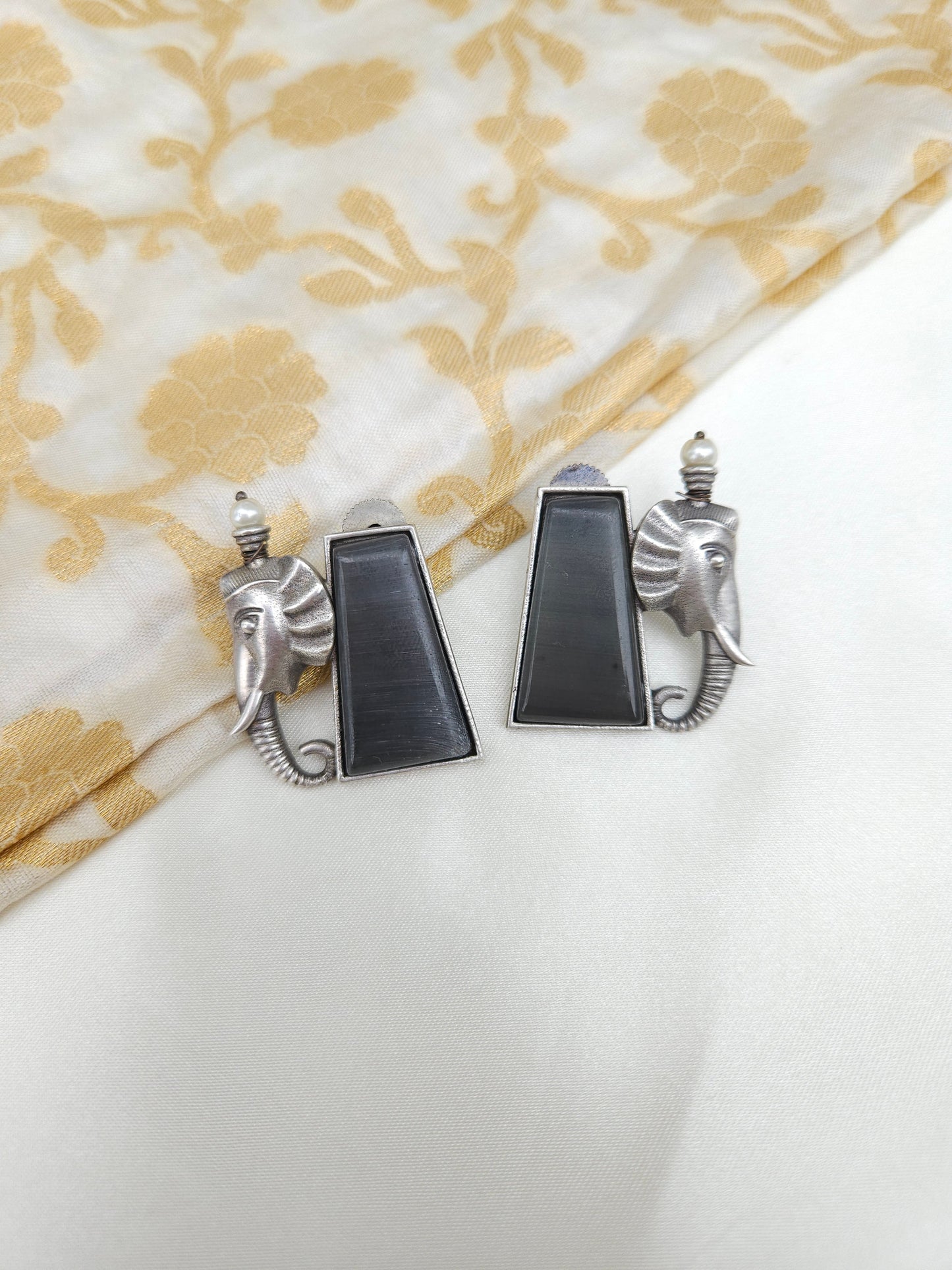 Aditya  silver alike earrings