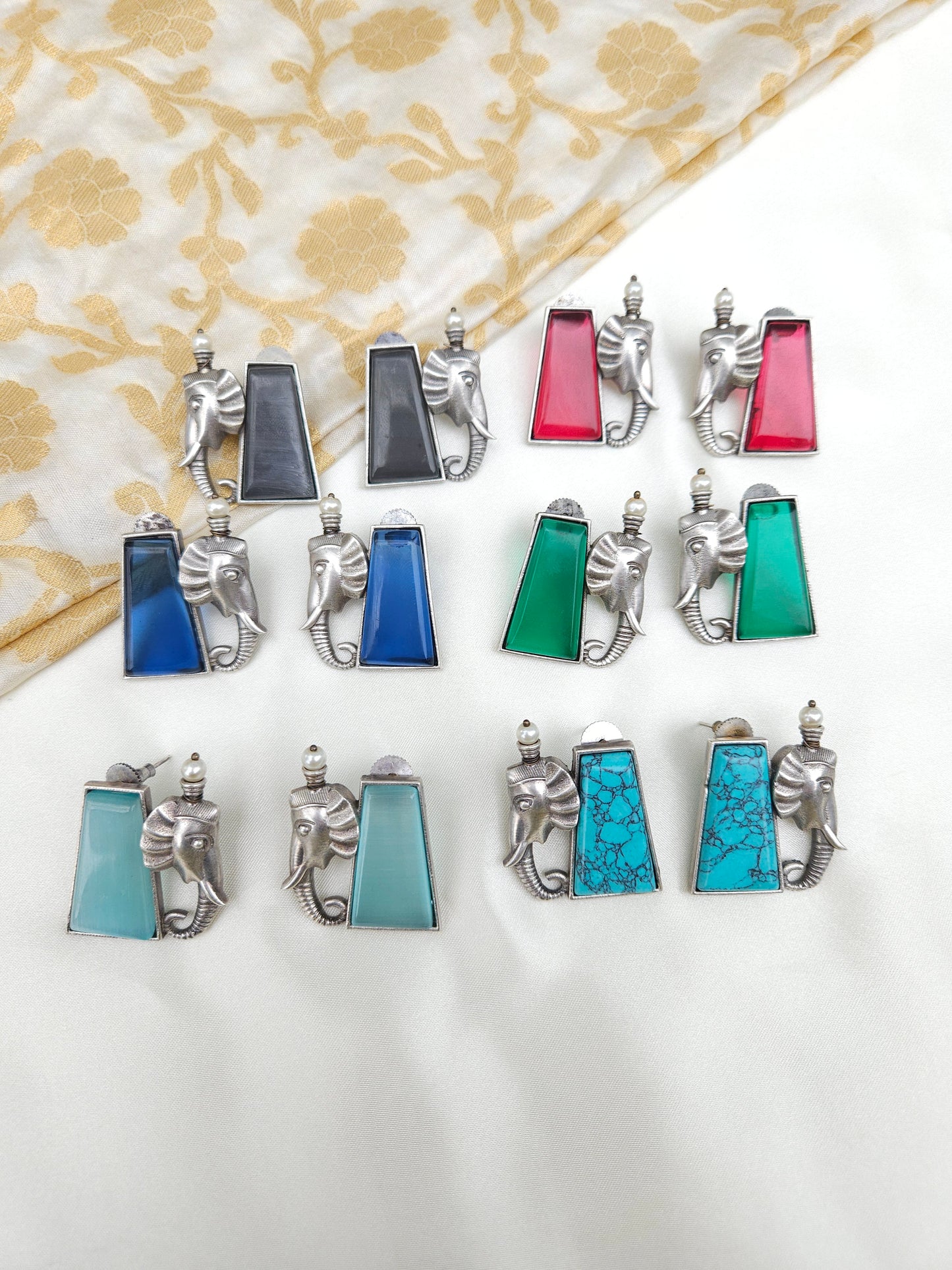 Aditya  silver alike earrings