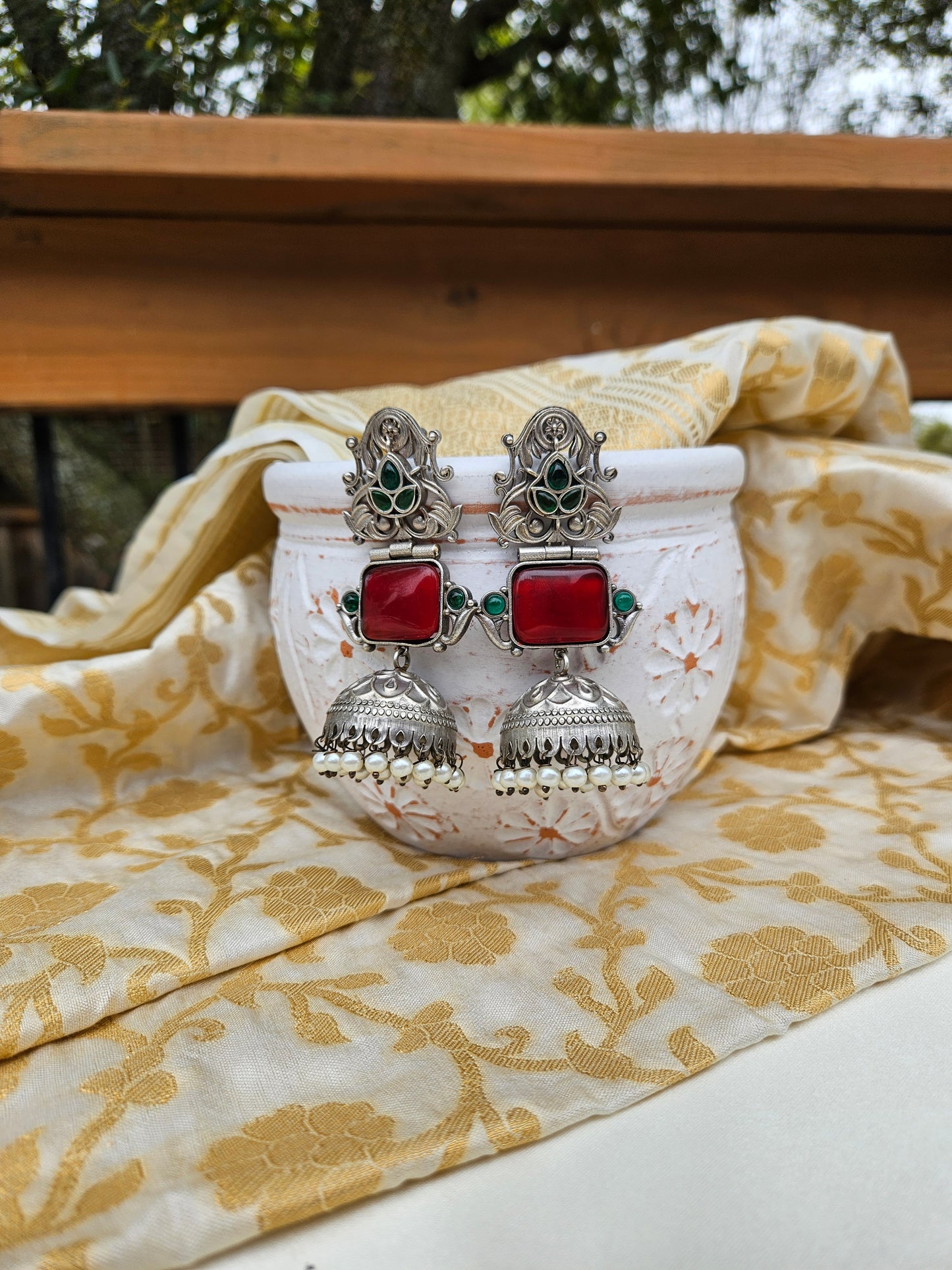 Aditya  silver alike jhumka earrings