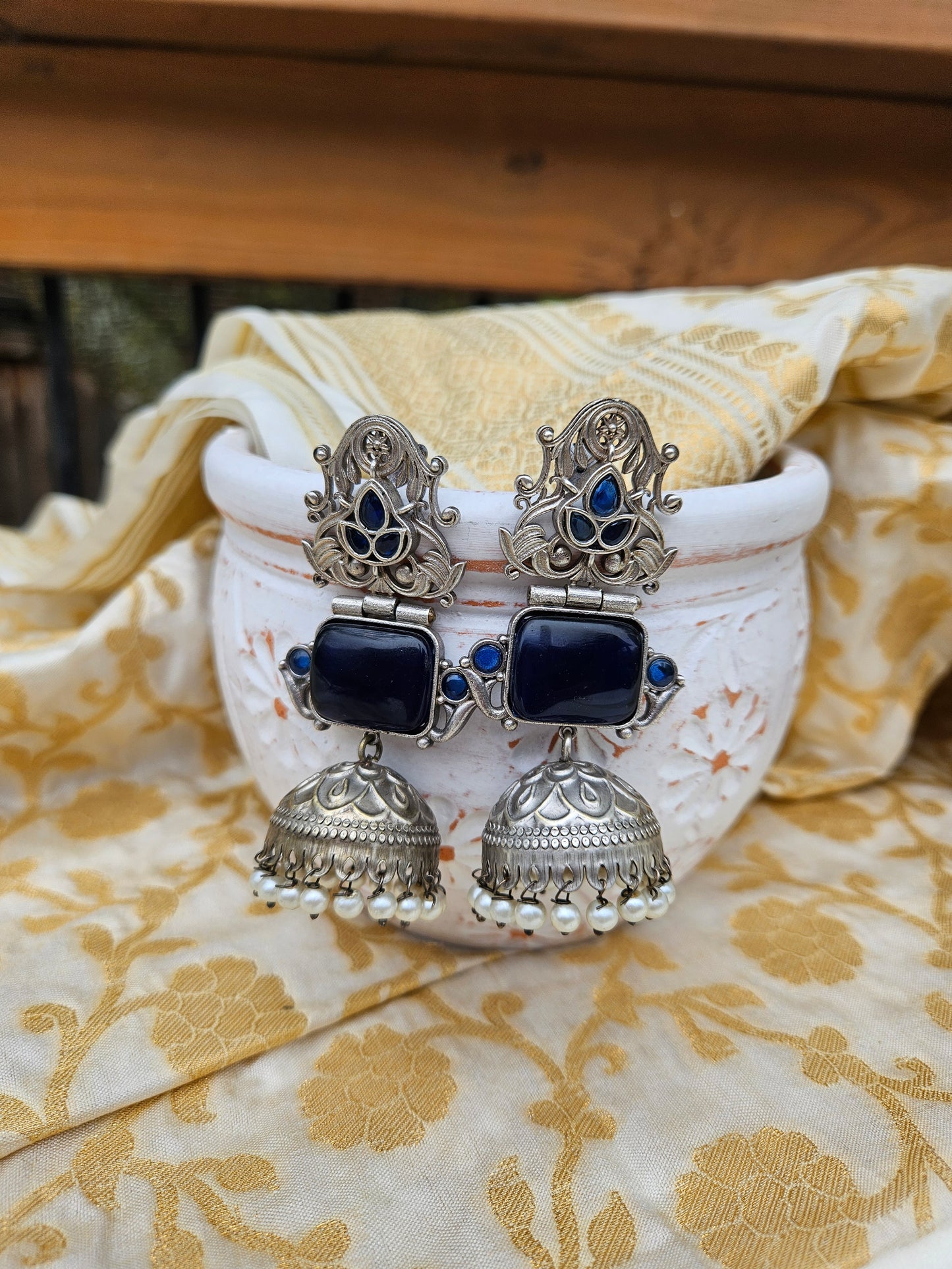 Aditya  silver alike jhumka earrings