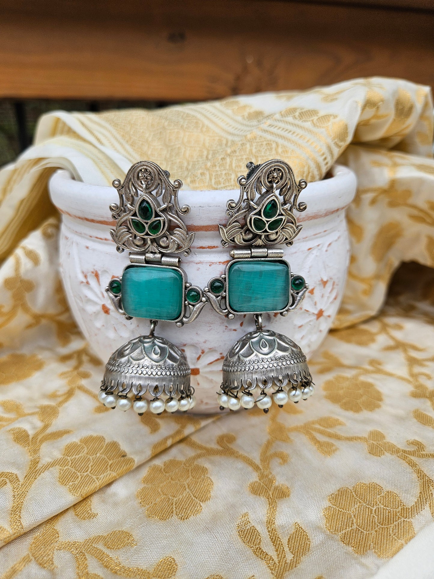 Aditya  silver alike jhumka earrings