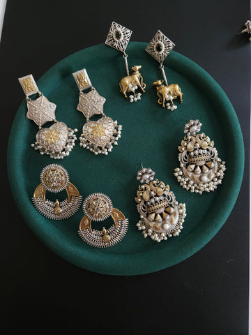 Dualtone silver alike earrings collection