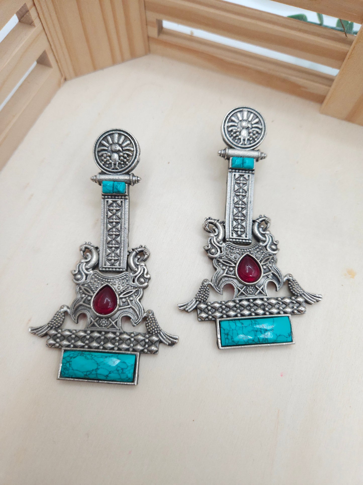 Anthara silveralike statement  earrings