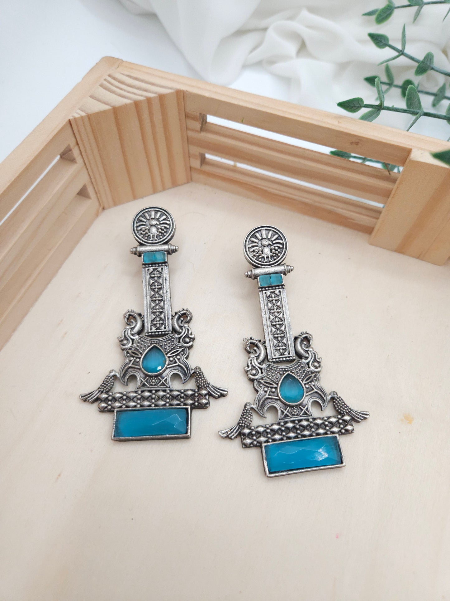 Anthara silveralike statement  earrings