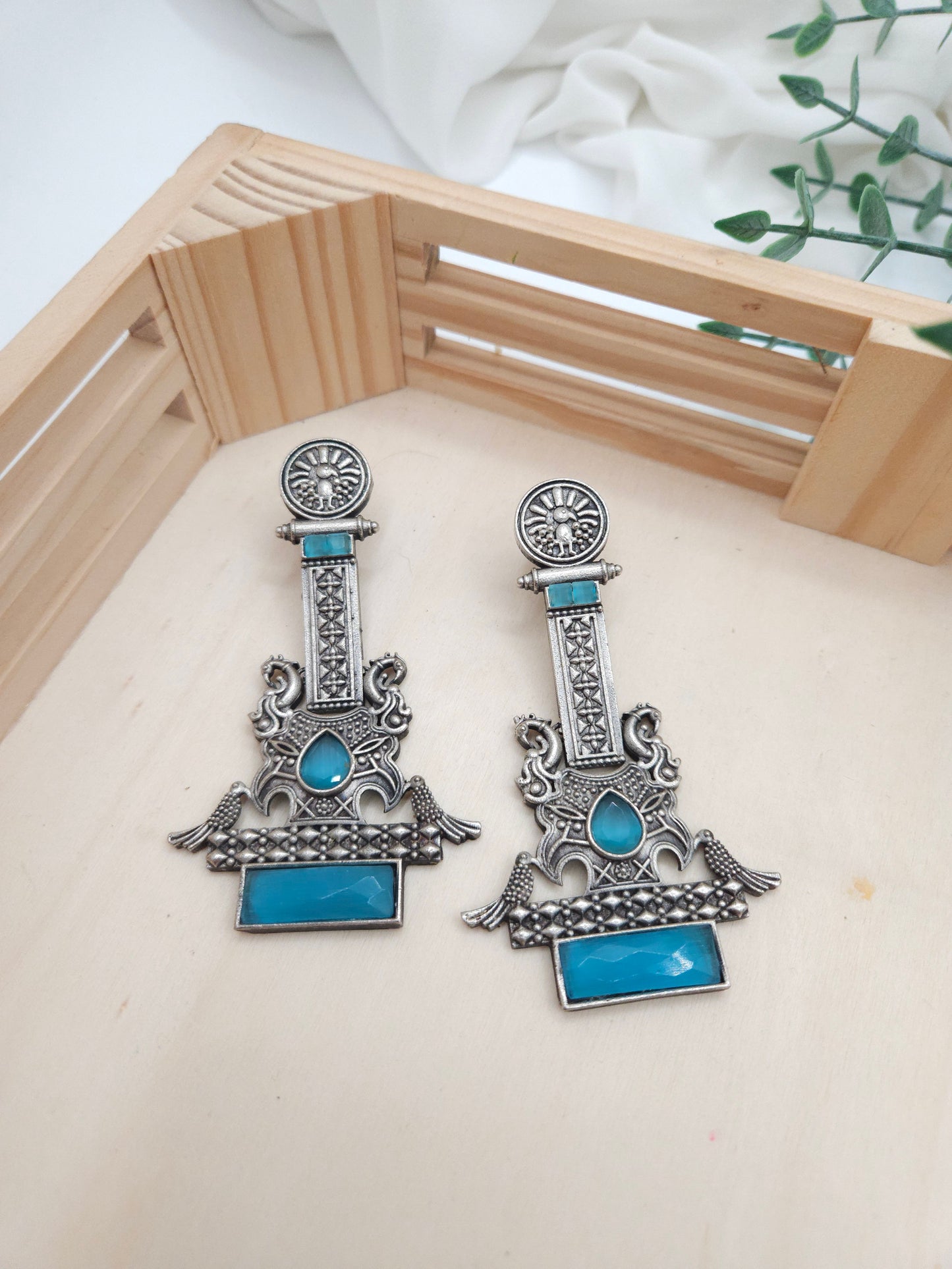 Anthara silveralike statement  earrings
