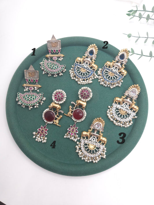 Dualtone silver alike earrings collection