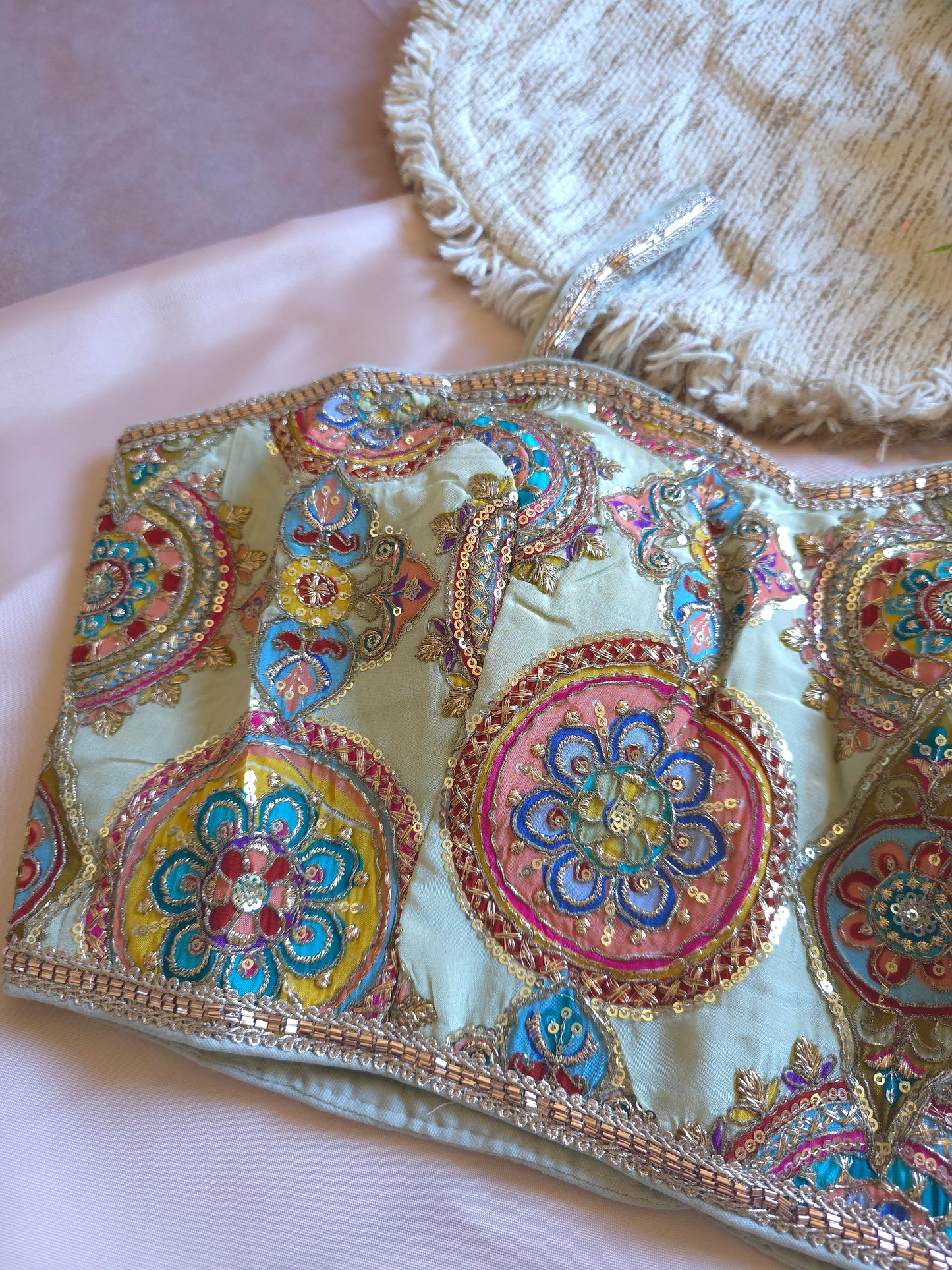 Purple Embroidered sleeveless Blouse