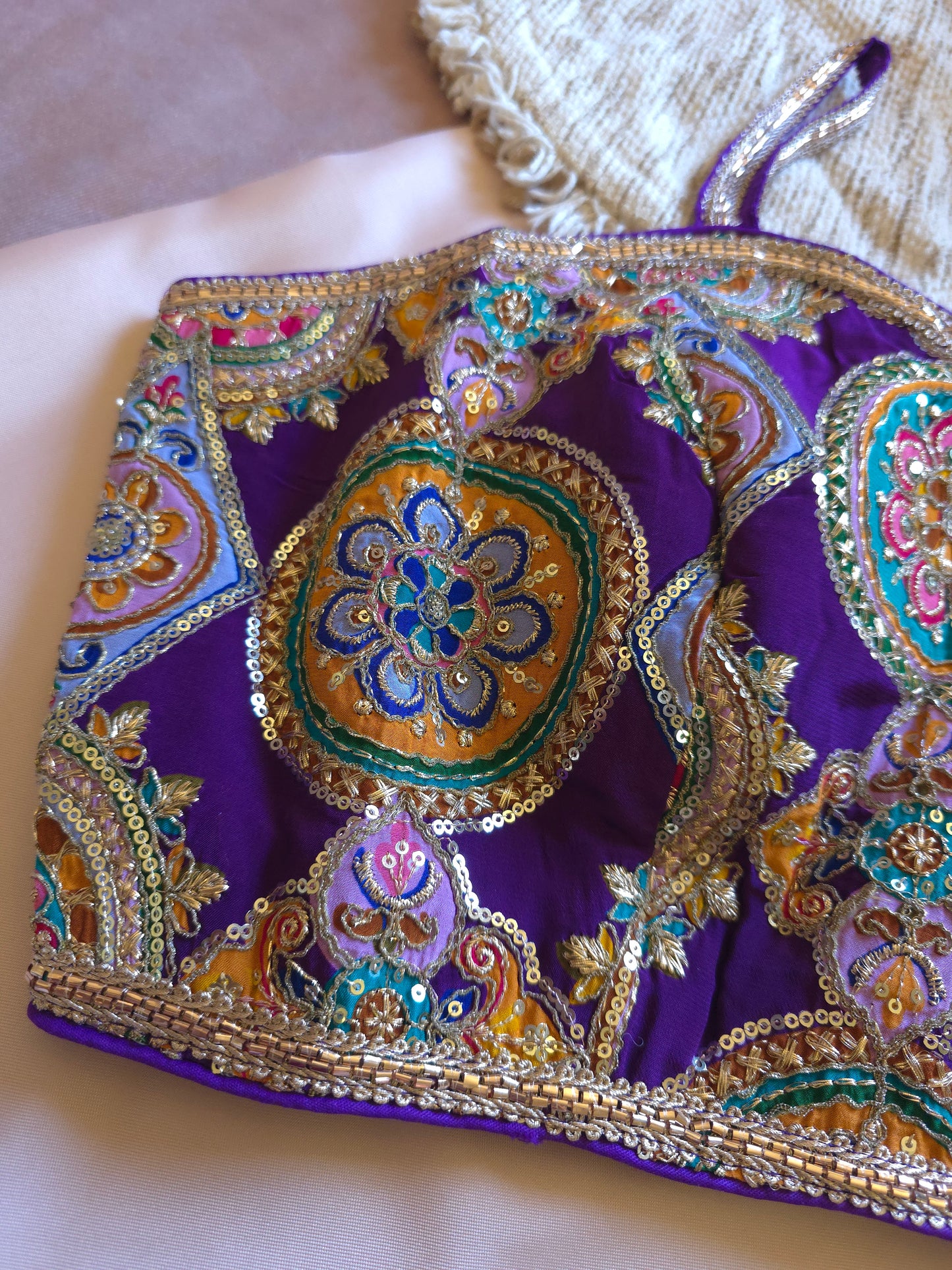 Purple Embroidered sleeveless Blouse