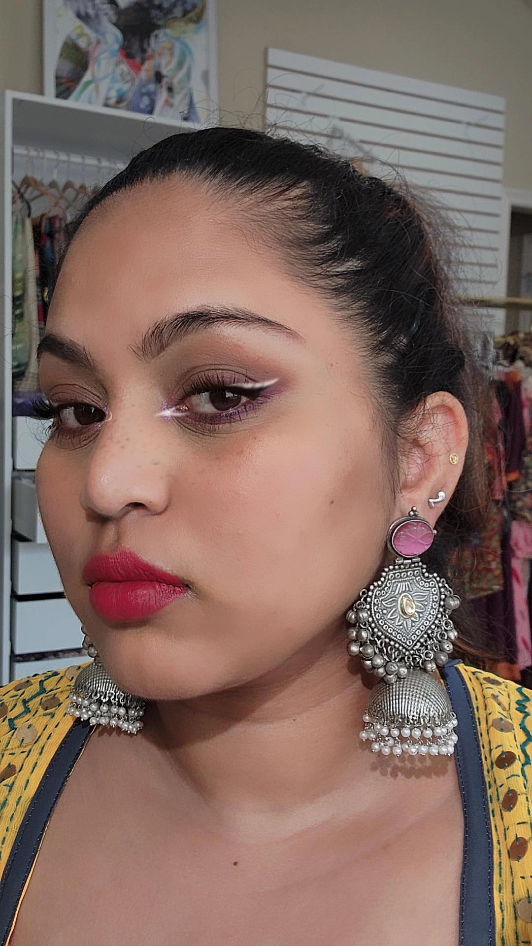 Keila silver polish fusion jhumka earrings
