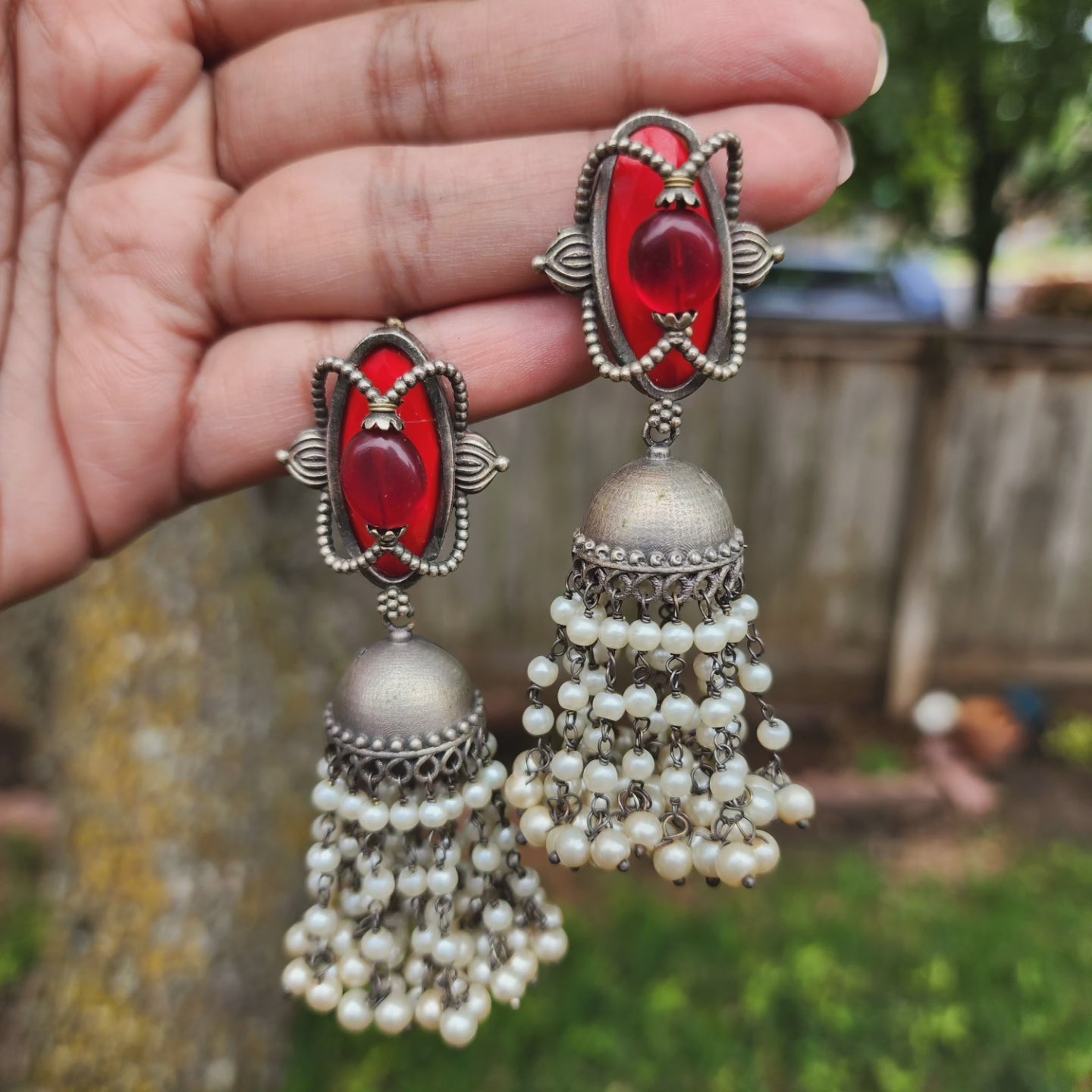 Maithri silver alike jhumka earrings
