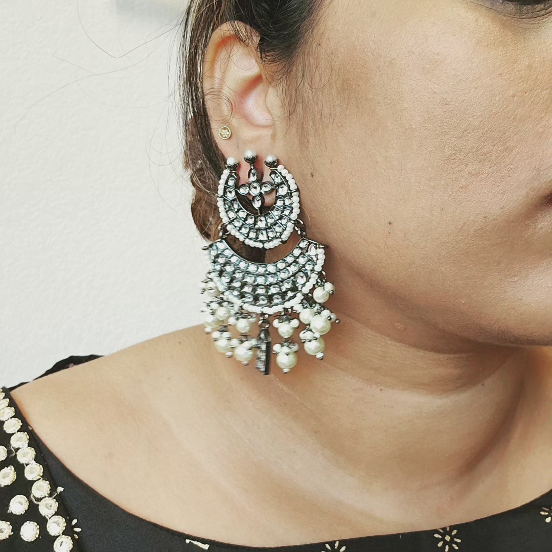 Black rodium plated jhumka earrings
