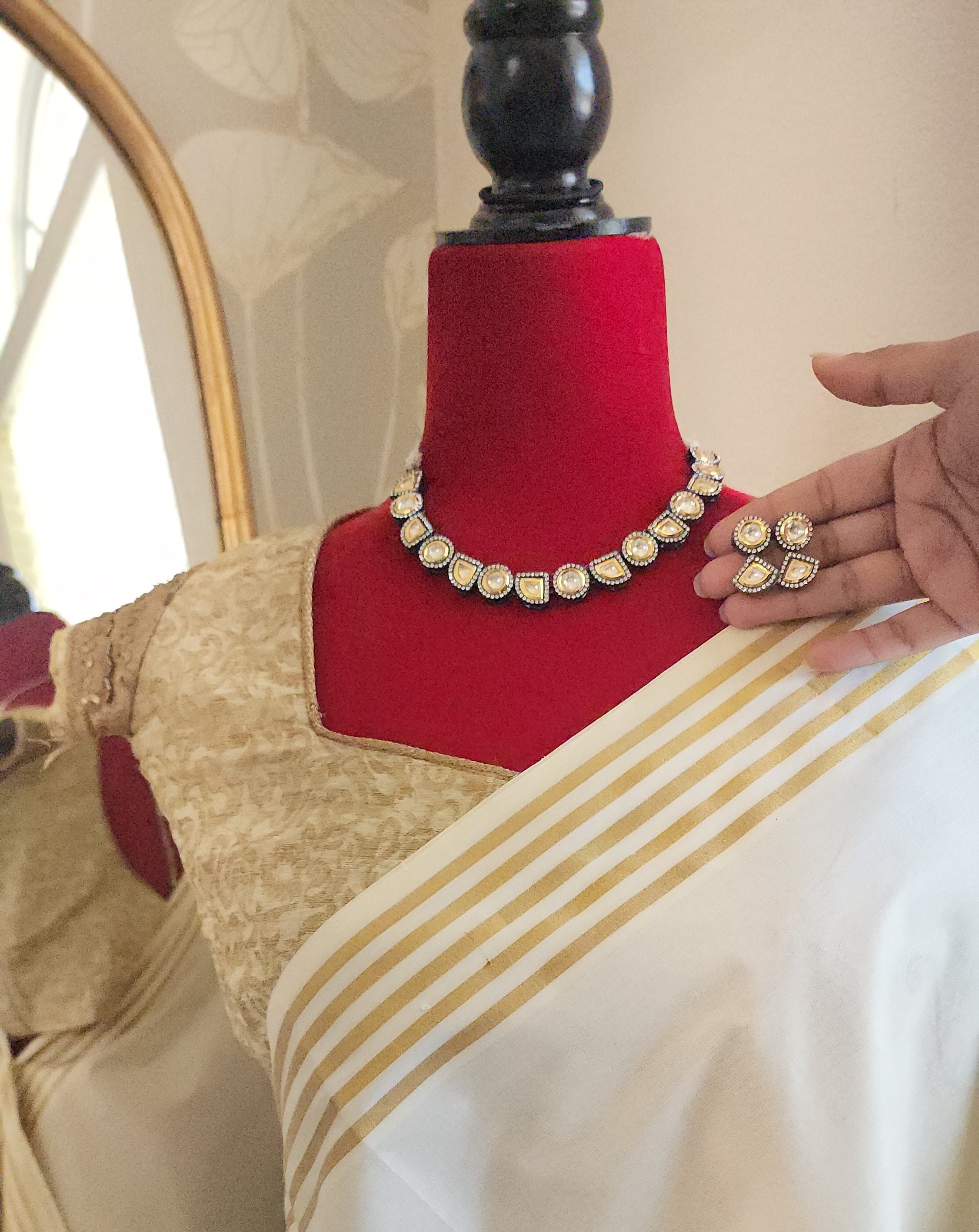 Rodium and goldplated dualtone kundan statement necklace set