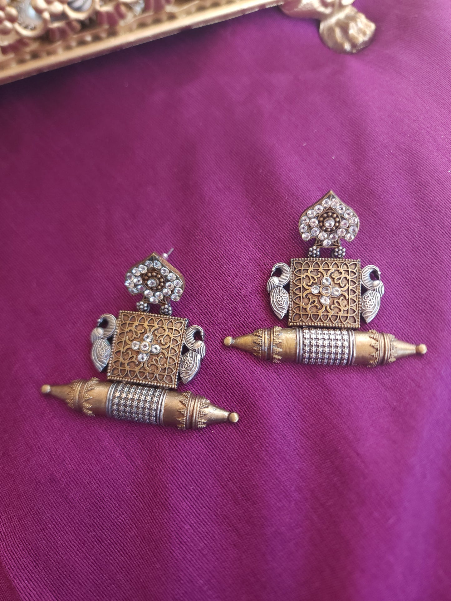Mogul dualtone silver alike earrings