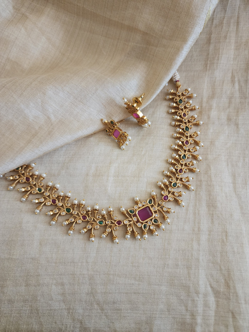 Beaded goldplated statement necklace set