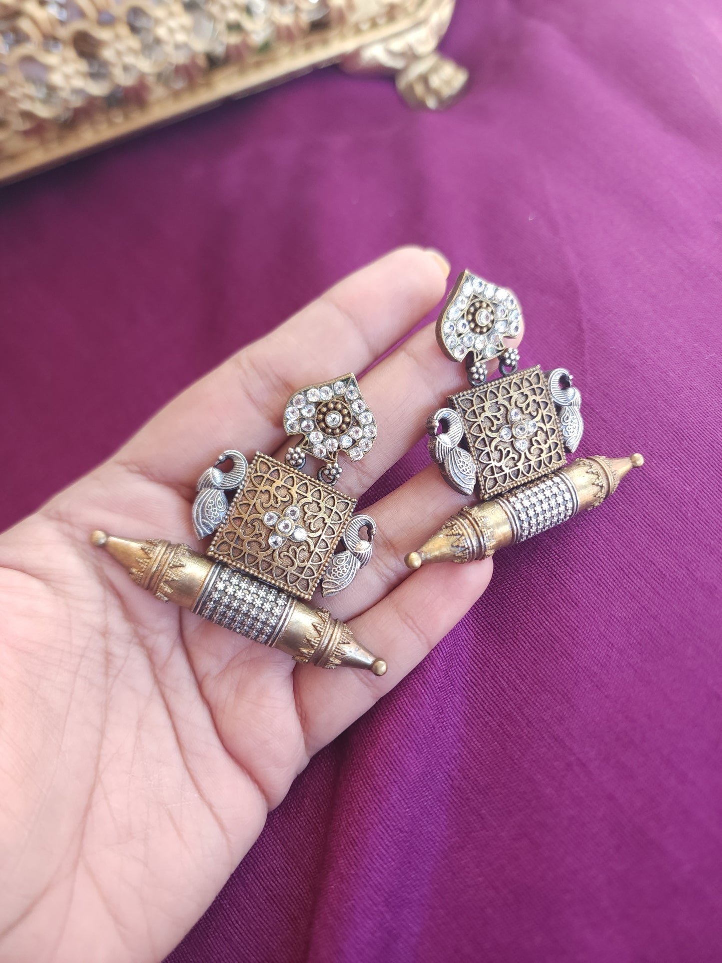 Mogul dualtone silver alike earrings