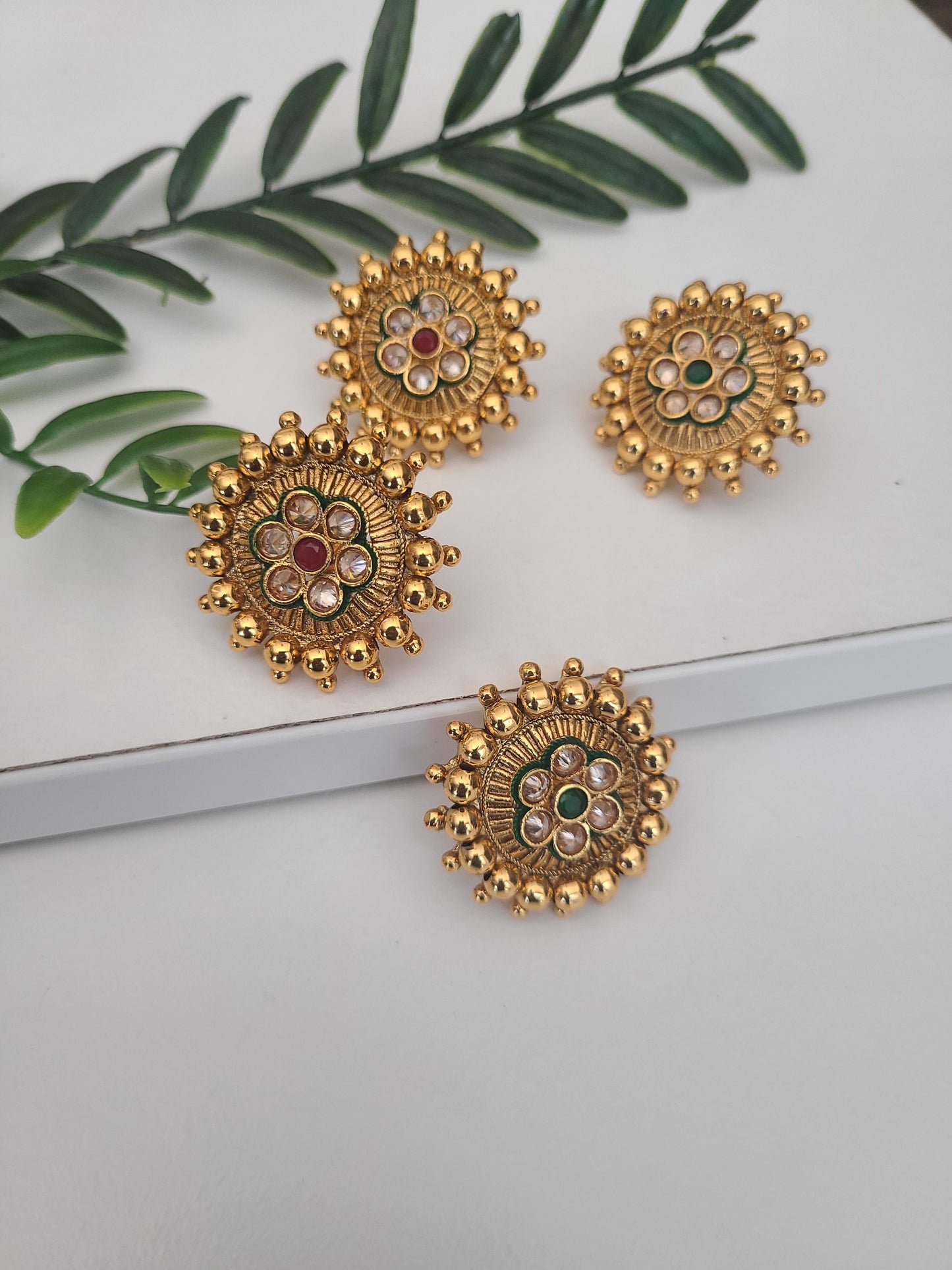 Gold tone stud earrings