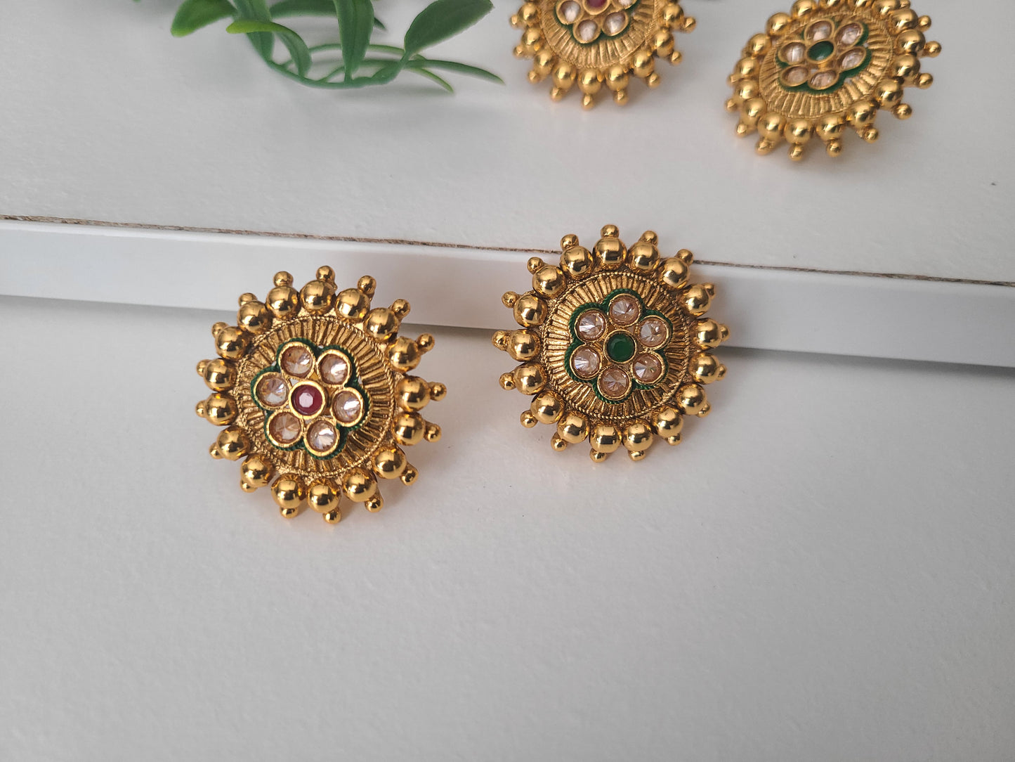 Gold tone stud earrings