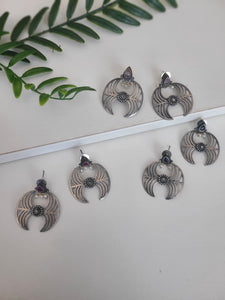 Unique silver alike earrings