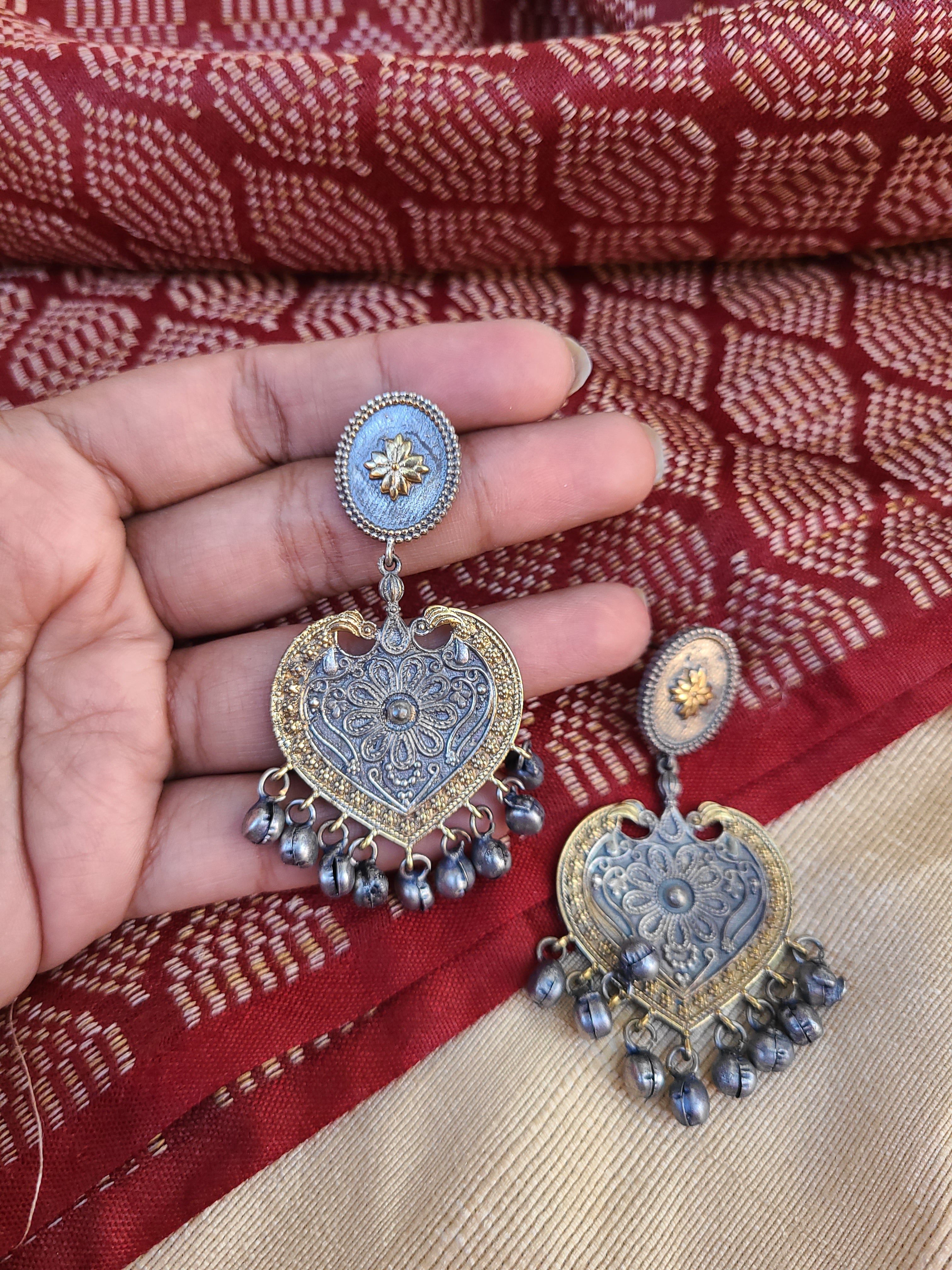 Chetna dual tone silver alike earrings