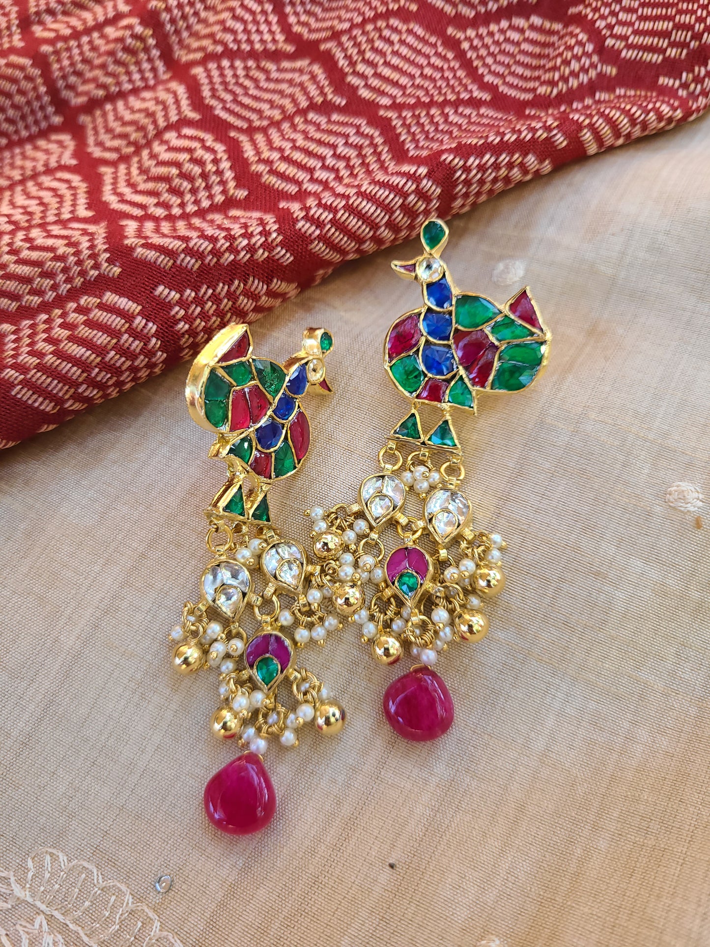Naomika pachi kundan earrings