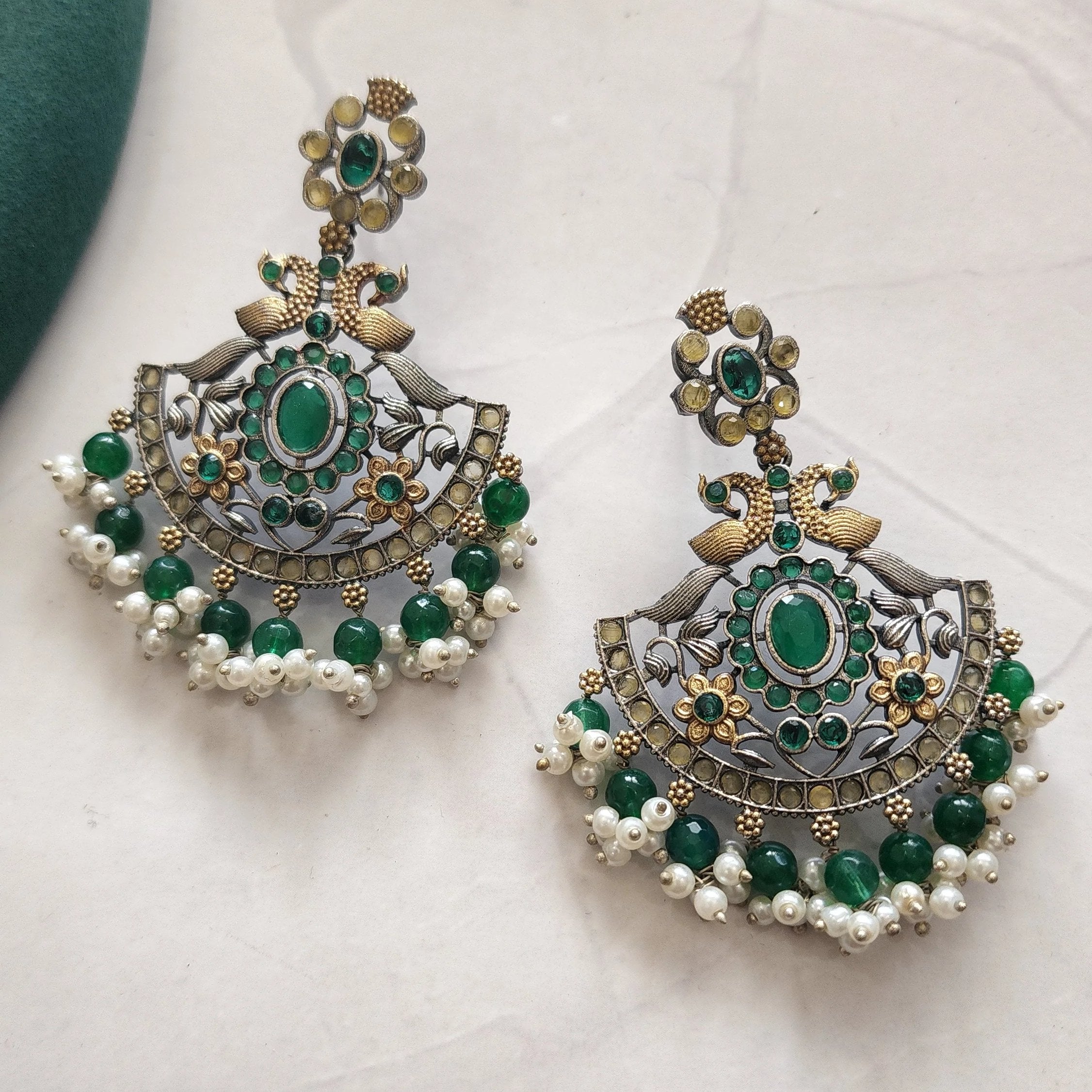 Chetna dual tone silver alike earrings